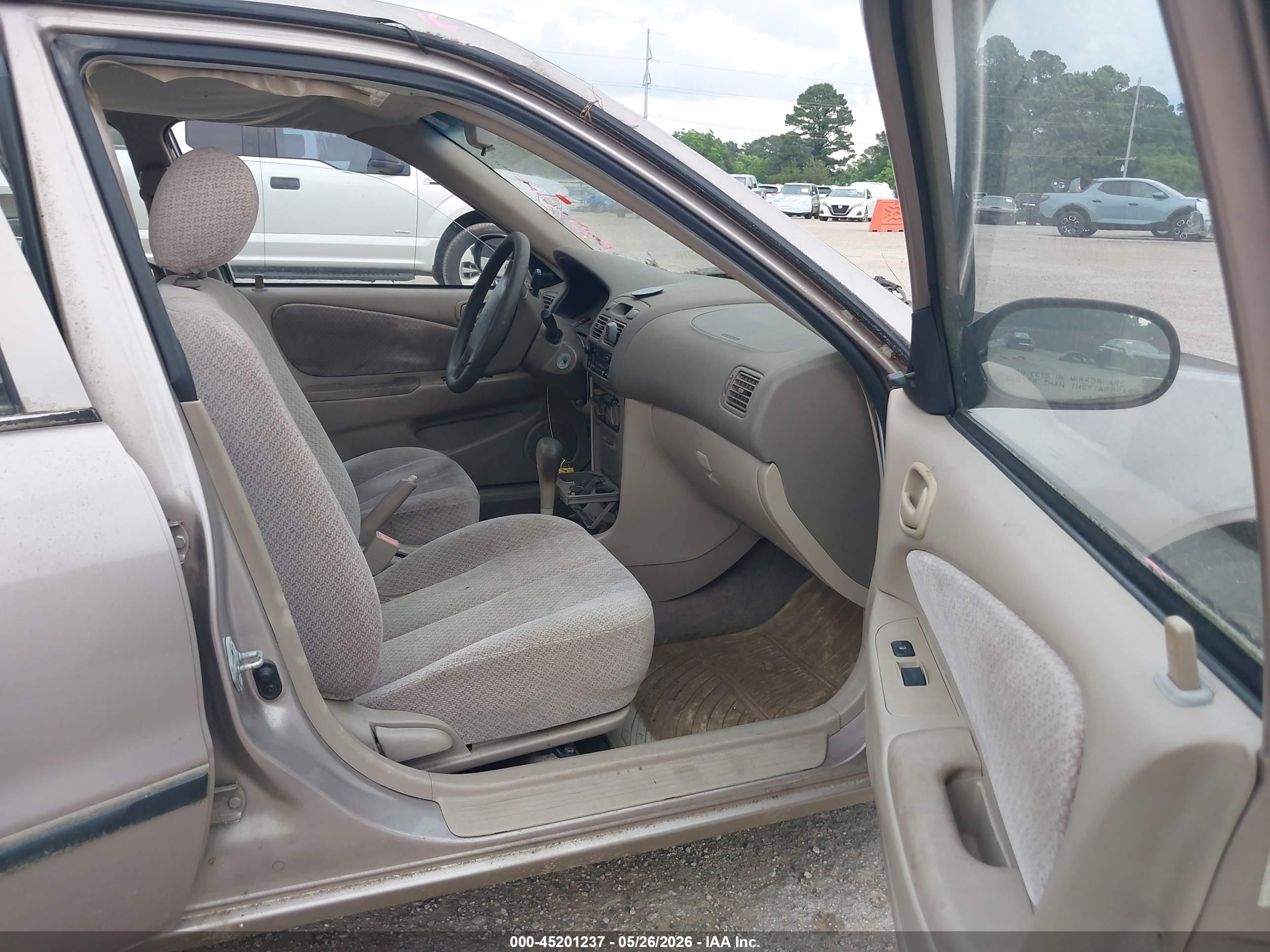 1999 Toyota Corolla Ce Tan vin: 2T1BR12E5XC175048