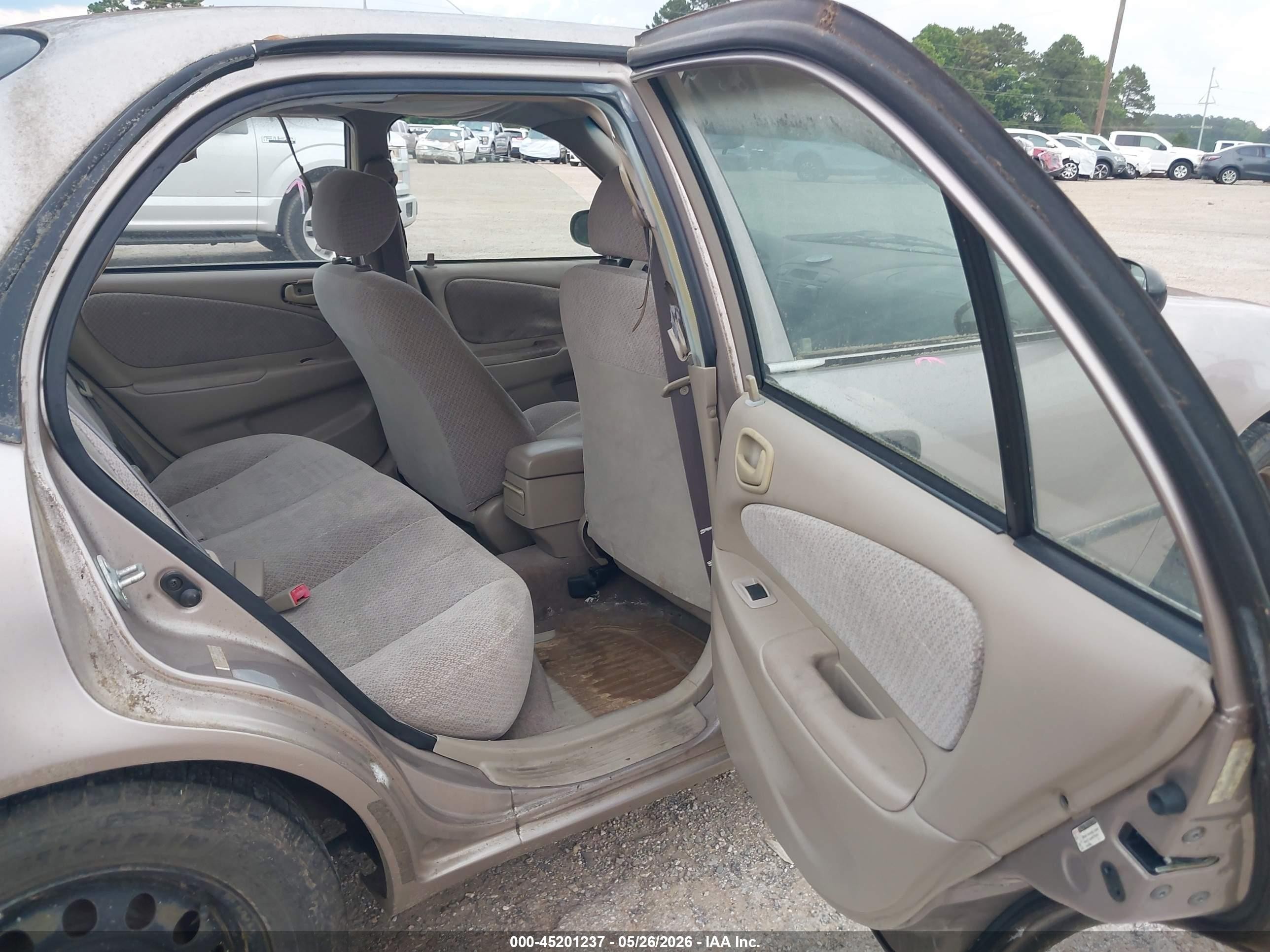 1999 Toyota Corolla Ce Tan vin: 2T1BR12E5XC175048