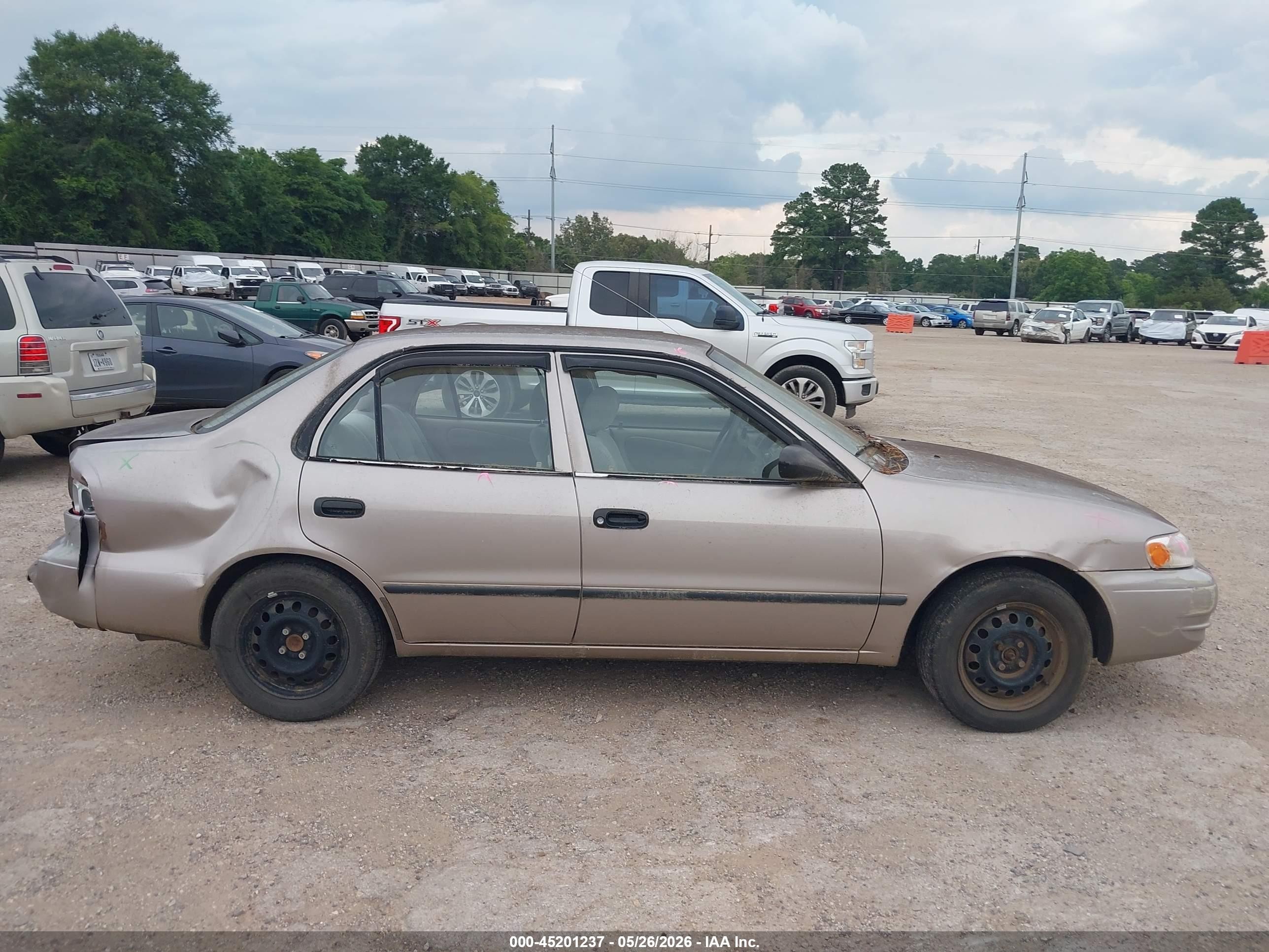 1999 Toyota Corolla Ce Tan vin: 2T1BR12E5XC175048