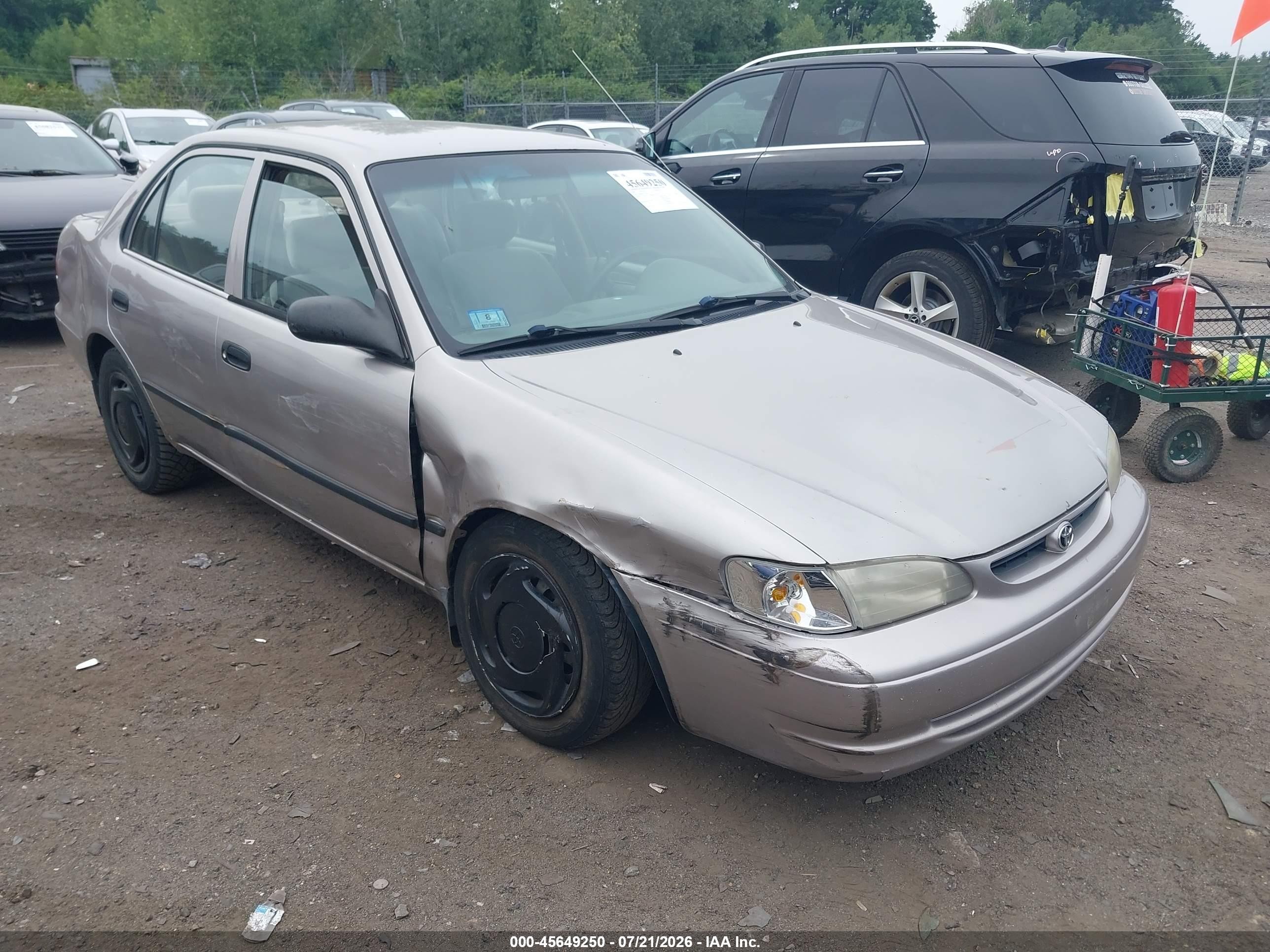 2000 Toyota Corolla Ce Gold vin: 2T1BR12E5YC356667