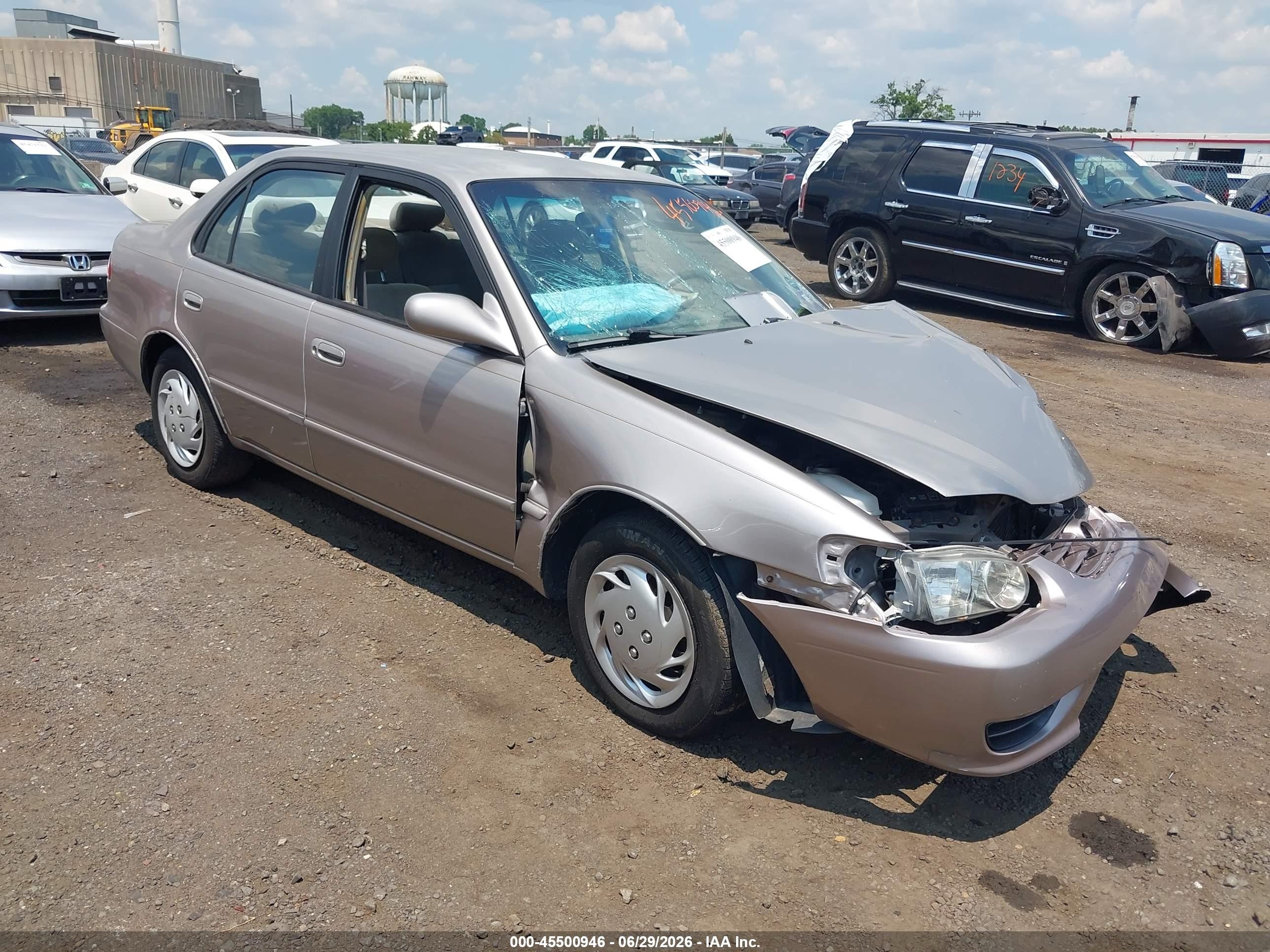 2001 Toyota Corolla Le Beige vin: 2T1BR12E61C432189