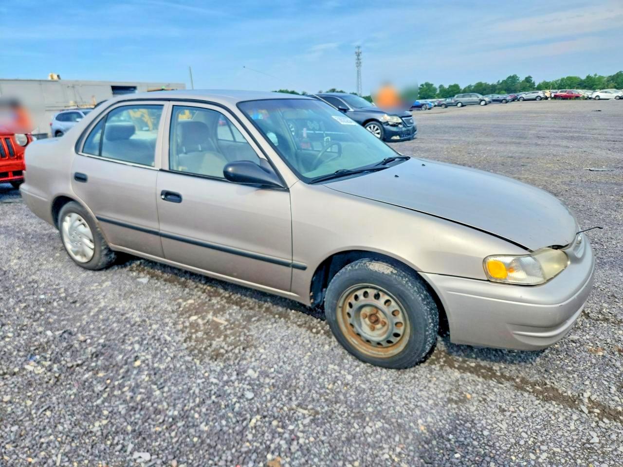 1999 Toyota Corolla Ve Tan vin: 2T1BR12E6XC240148