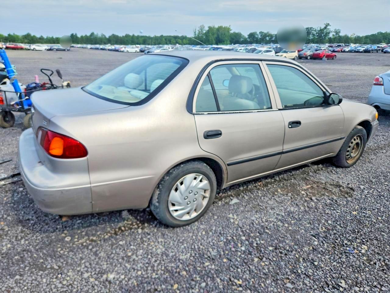 1999 Toyota Corolla Ve Tan vin: 2T1BR12E6XC240148