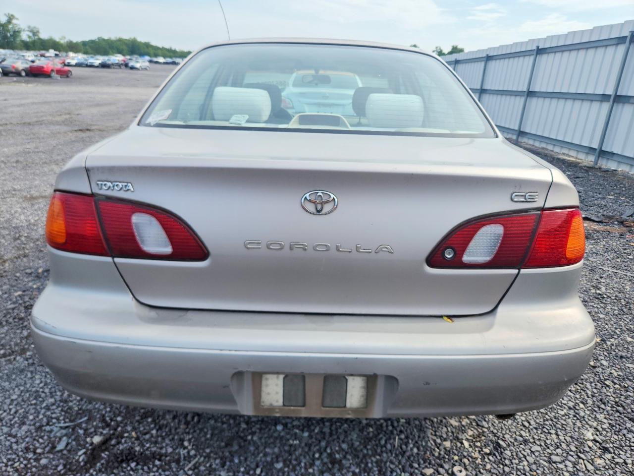 1999 Toyota Corolla Ve Tan vin: 2T1BR12E6XC240148