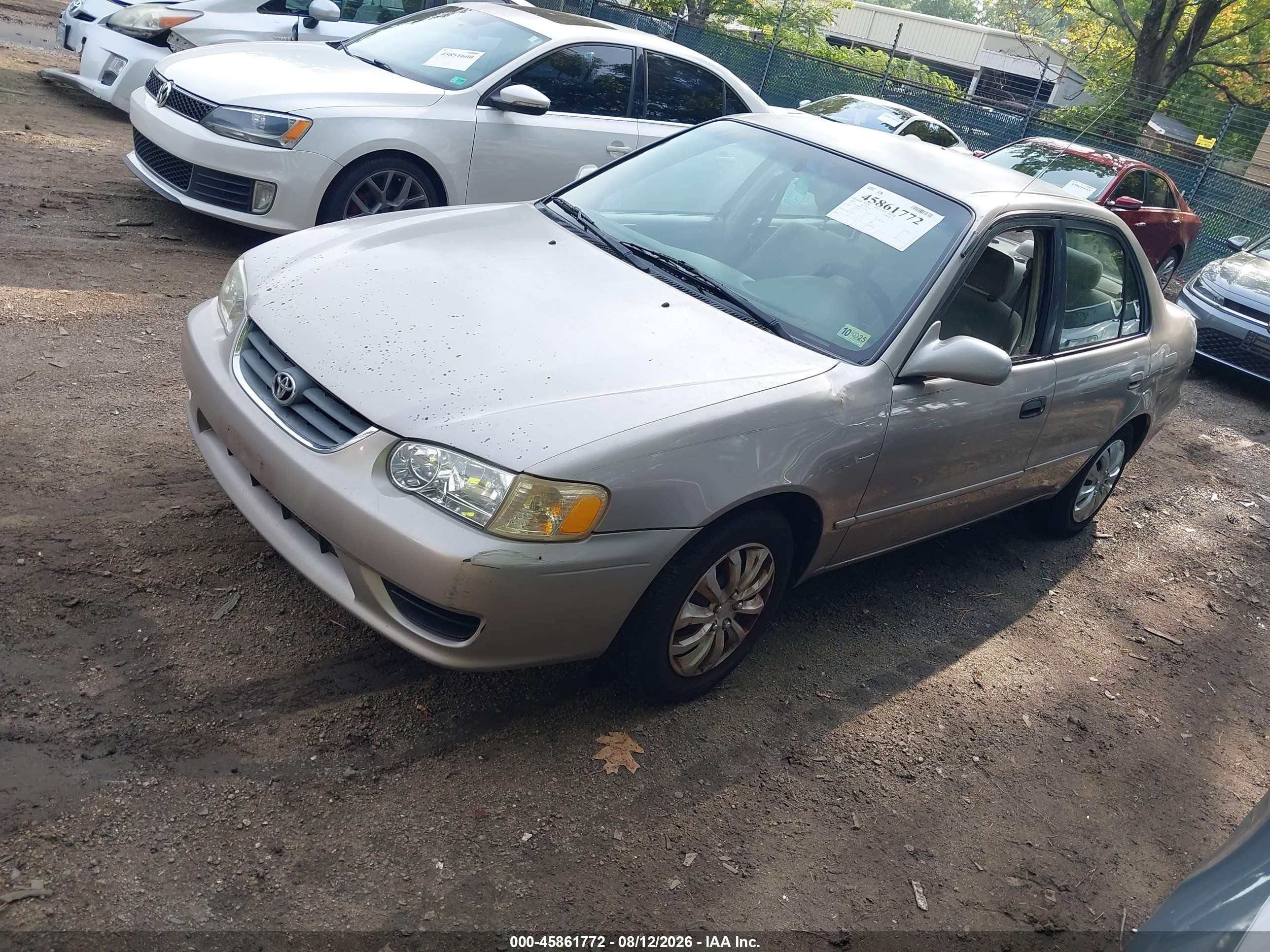 2002 Toyota Corolla Le Champagne vin: 2T1BR12E72C522565