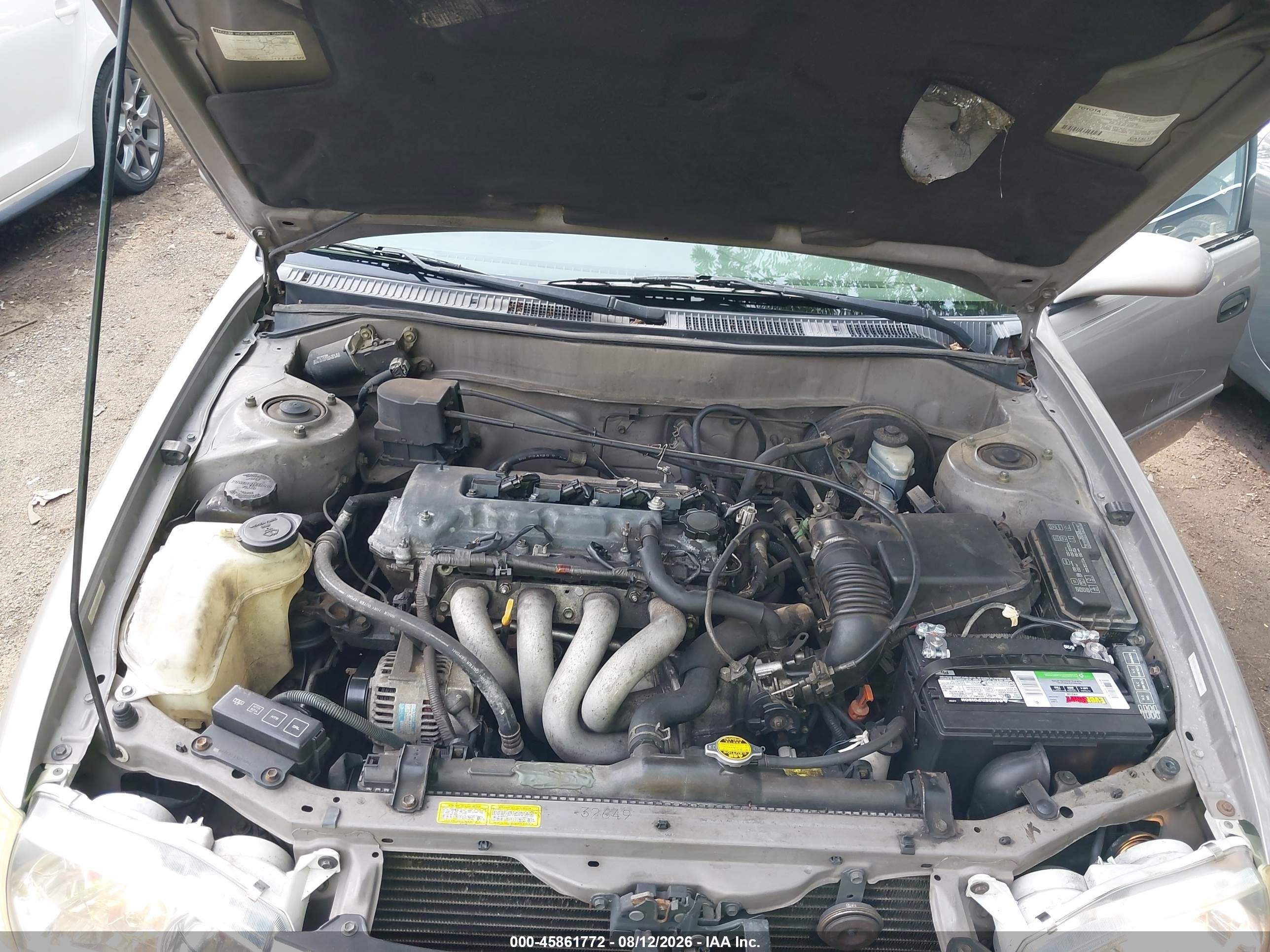 2002 Toyota Corolla Le Champagne vin: 2T1BR12E72C522565