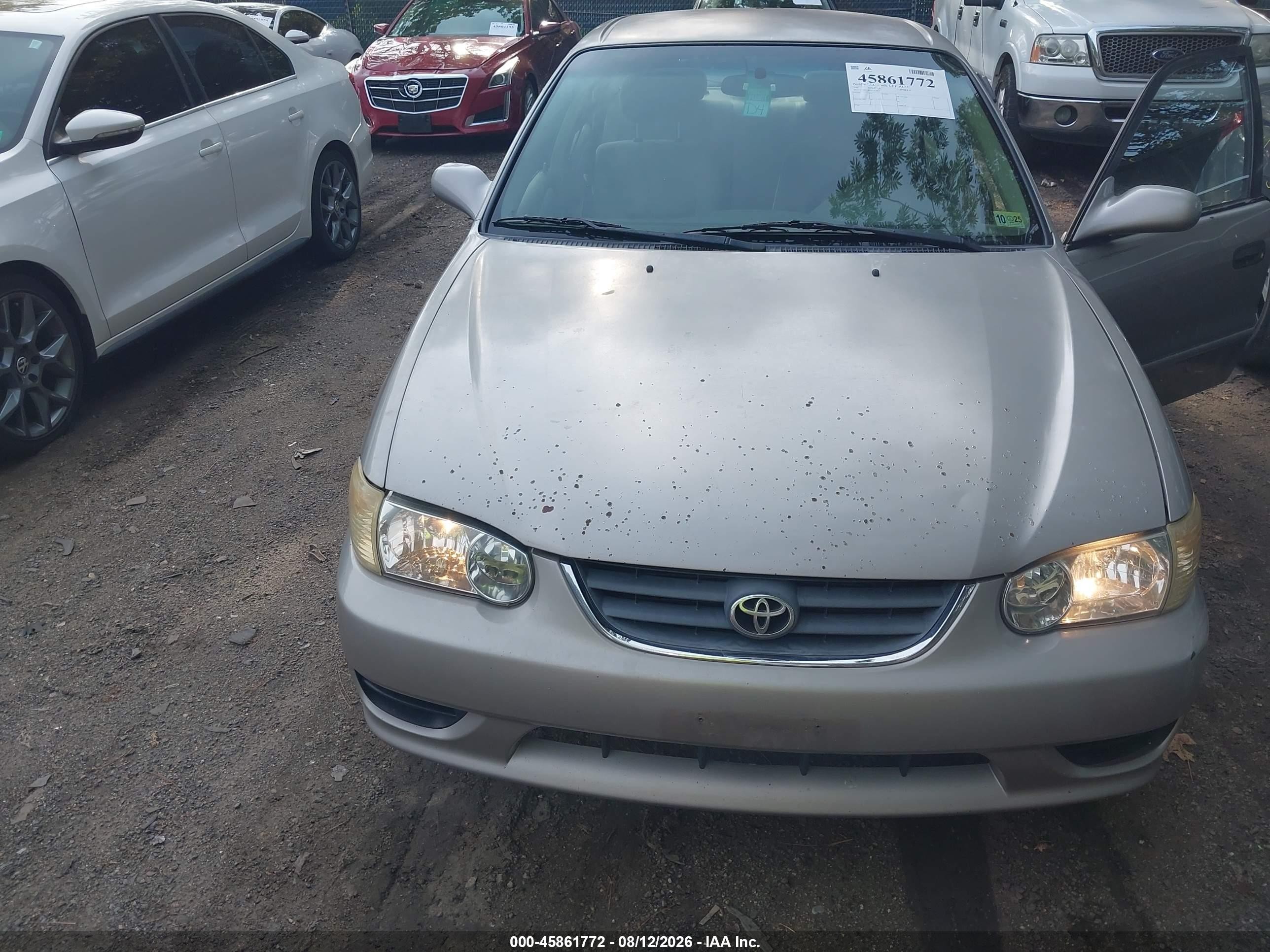 2002 Toyota Corolla Le Champagne vin: 2T1BR12E72C522565