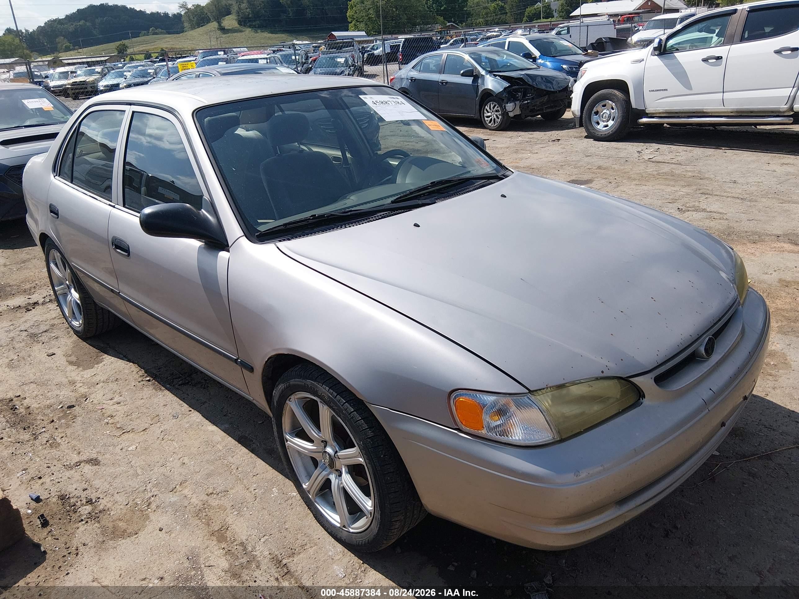 1999 Toyota Corolla Ce Champagne vin: 2T1BR12E7XC104014