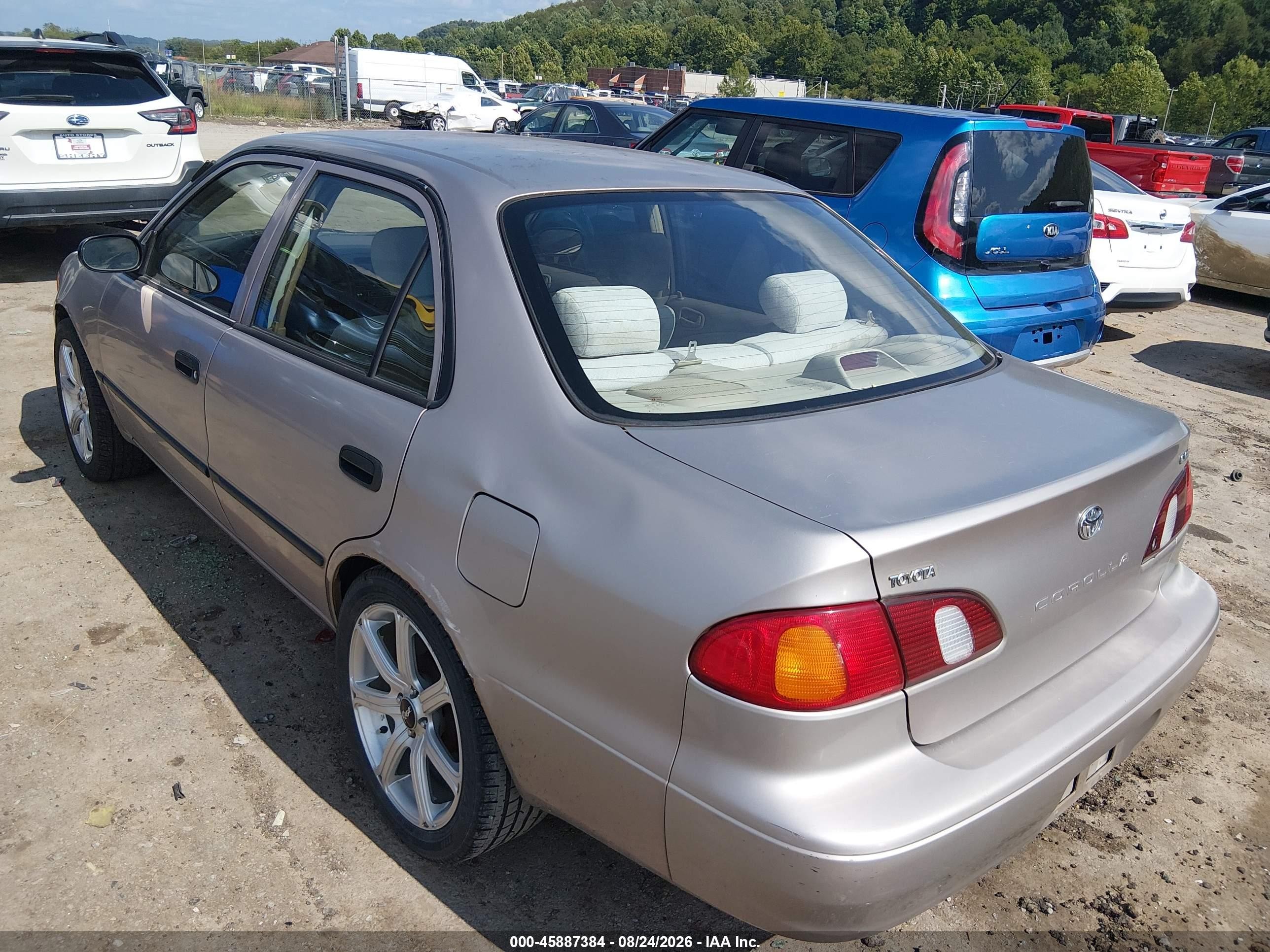 1999 Toyota Corolla Ce Champagne vin: 2T1BR12E7XC104014