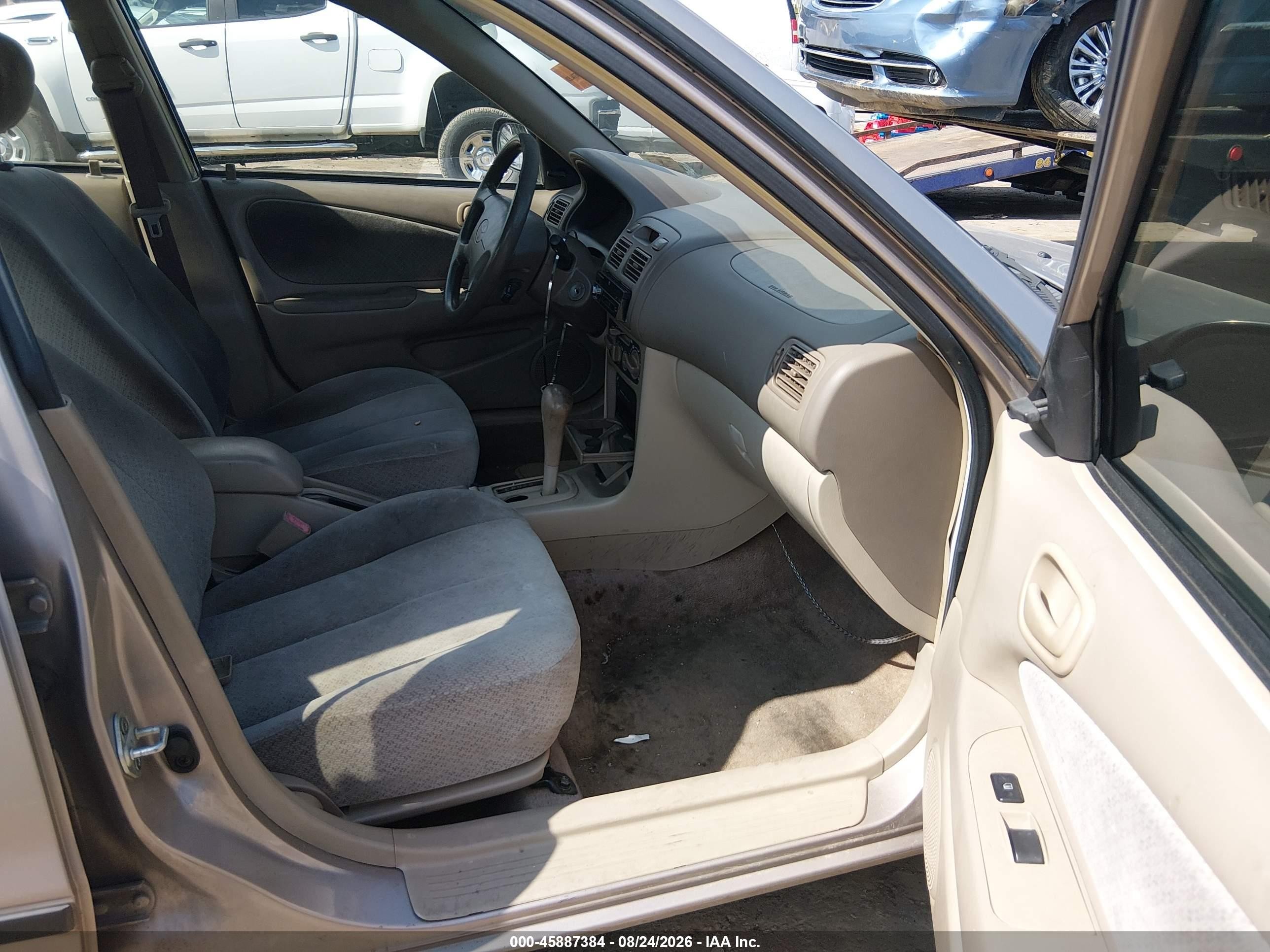 1999 Toyota Corolla Ce Champagne vin: 2T1BR12E7XC104014