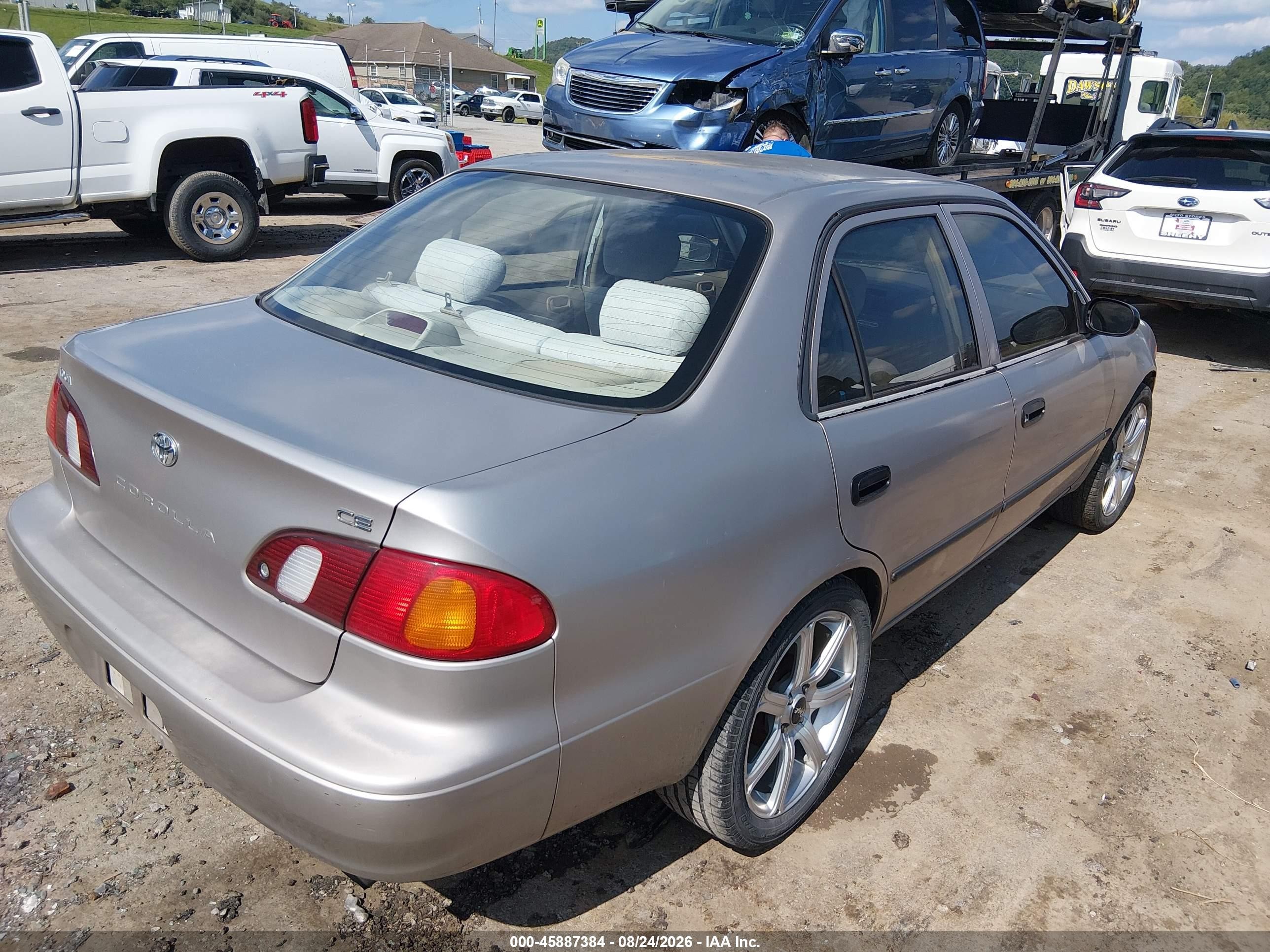 1999 Toyota Corolla Ce Champagne vin: 2T1BR12E7XC104014
