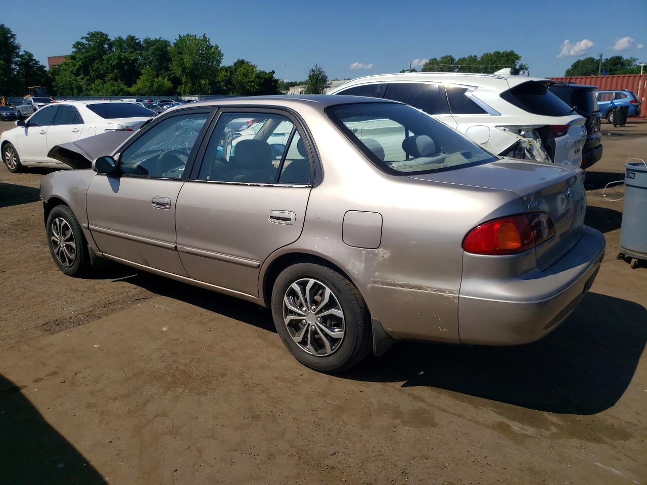 2002 Toyota Corolla Le Коричневый vin: 2T1BR12E82C547295