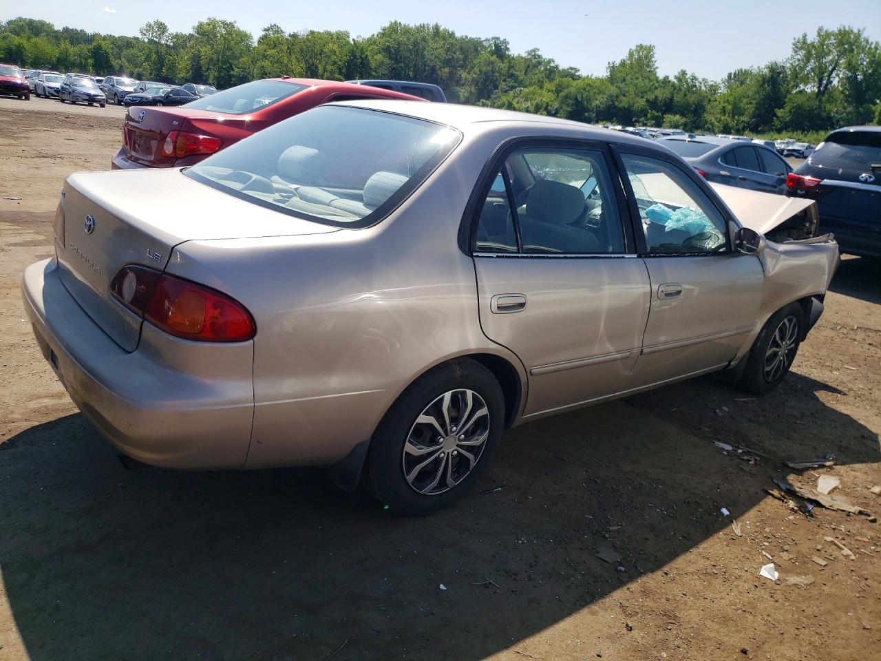 2002 Toyota Corolla Le Коричневый vin: 2T1BR12E82C547295