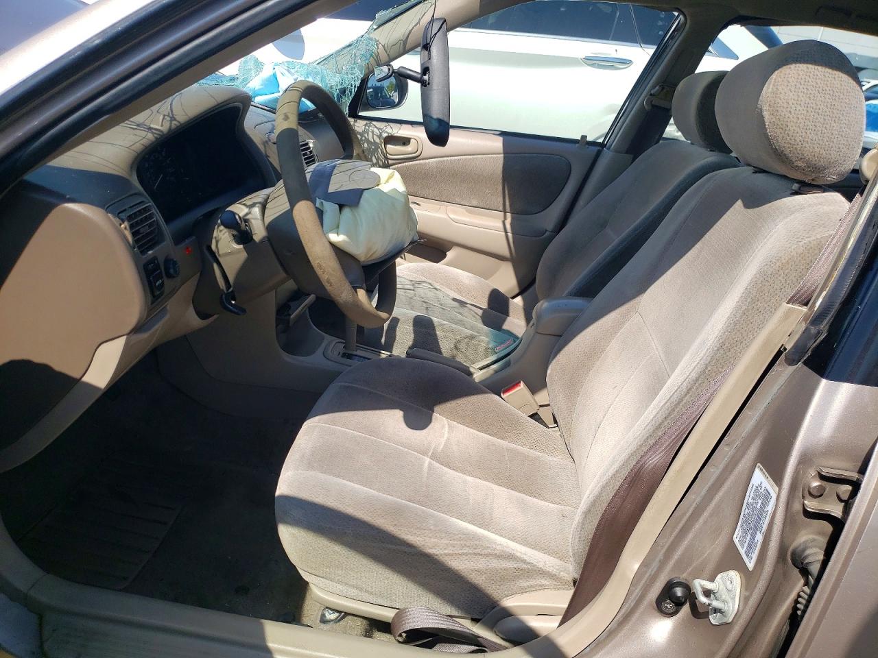 2002 Toyota Corolla Le Коричневый vin: 2T1BR12E82C547295