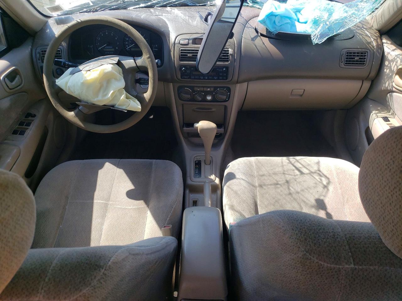 2002 Toyota Corolla Le Коричневый vin: 2T1BR12E82C547295