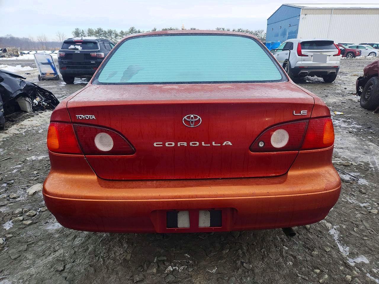 2002 Toyota Corolla Le Red vin: 2T1BR12E82C561195
