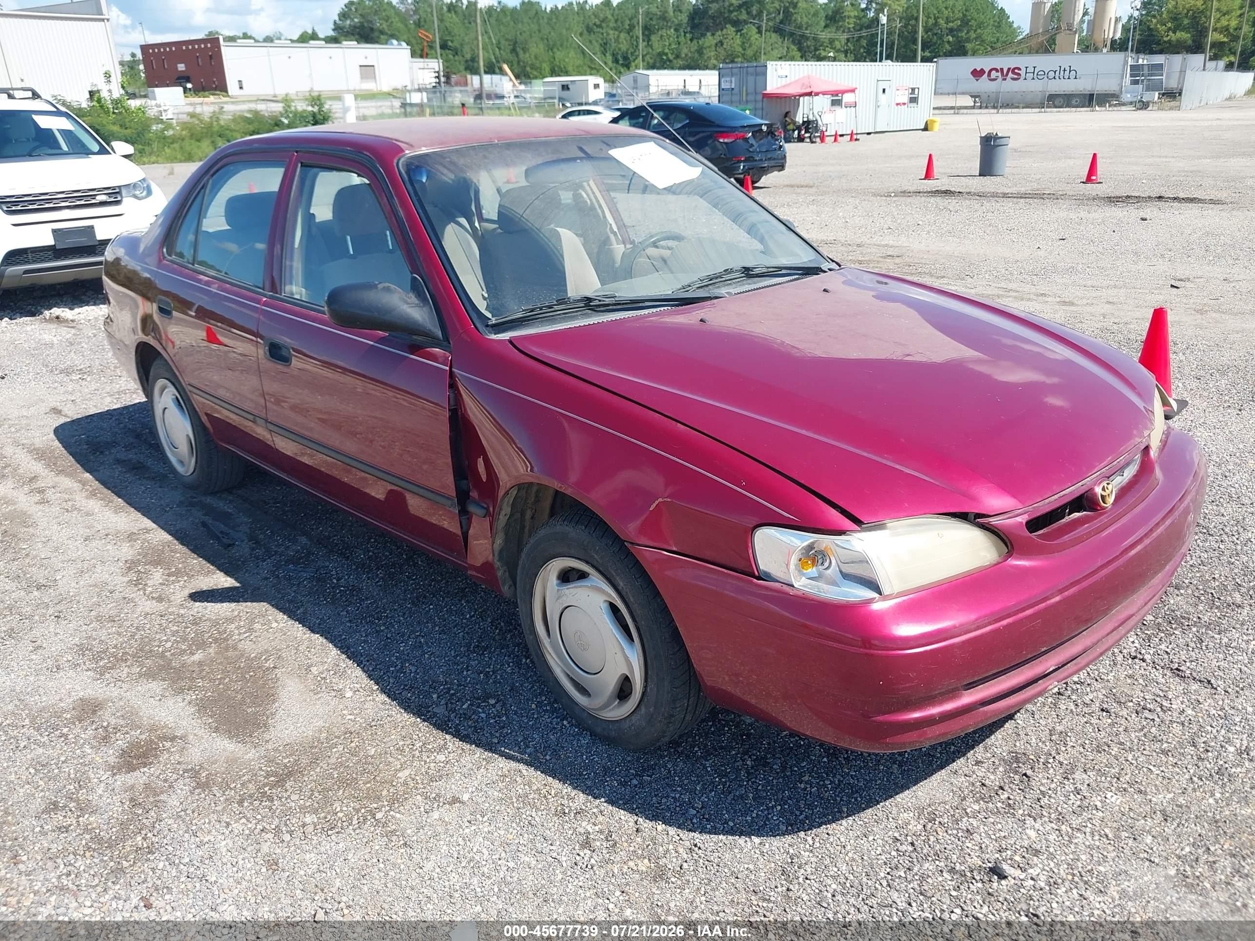 1999 Toyota Corolla Ce Red vin: 2T1BR12E8XC188201