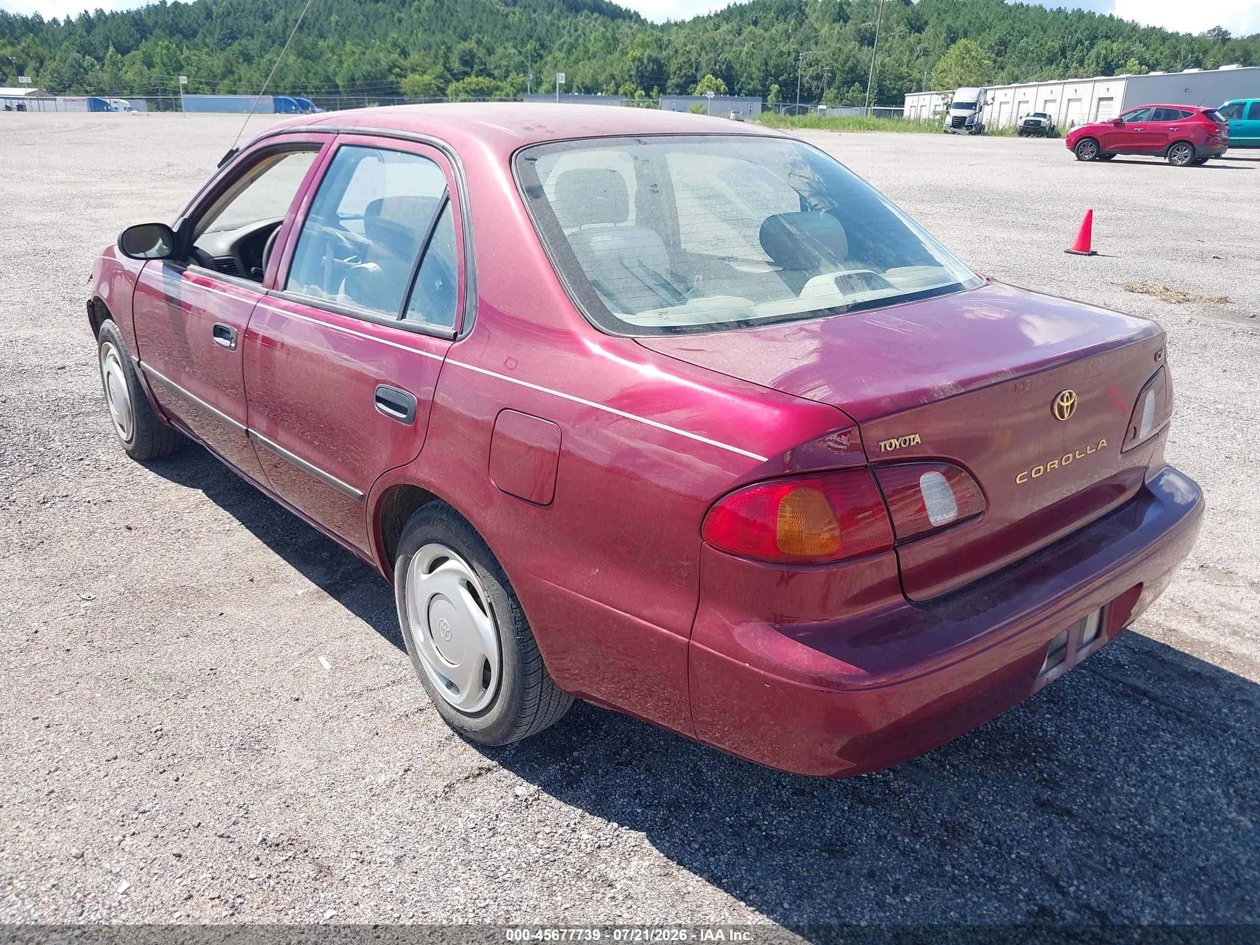 1999 Toyota Corolla Ce Red vin: 2T1BR12E8XC188201