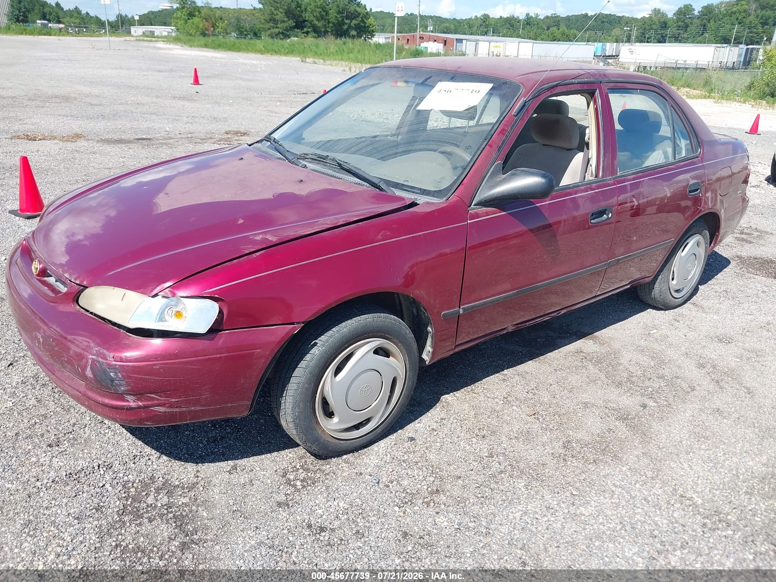 1999 Toyota Corolla Ce Red vin: 2T1BR12E8XC188201