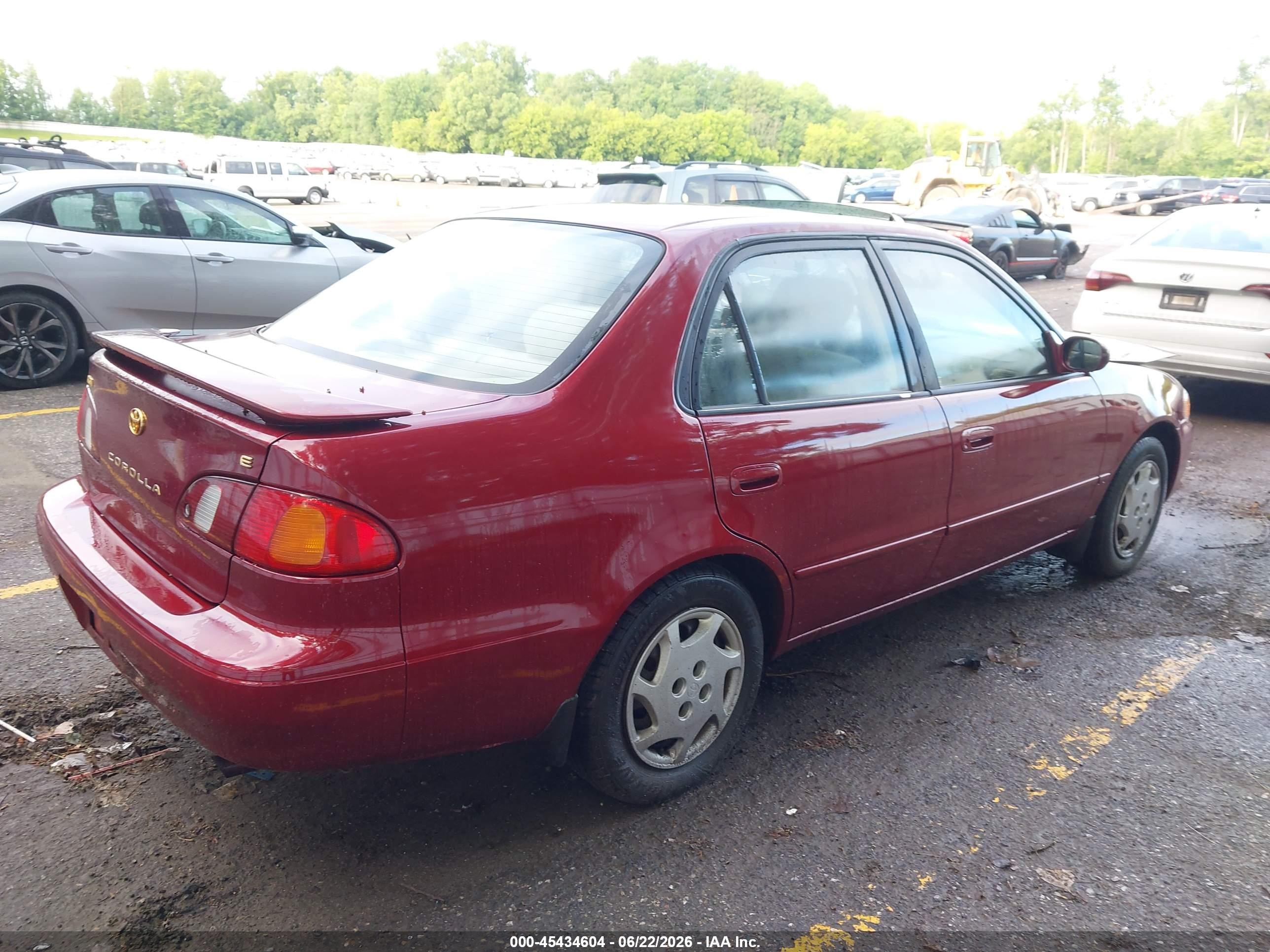 1999 Toyota Corolla Le Red vin: 2T1BR12E9XC187560