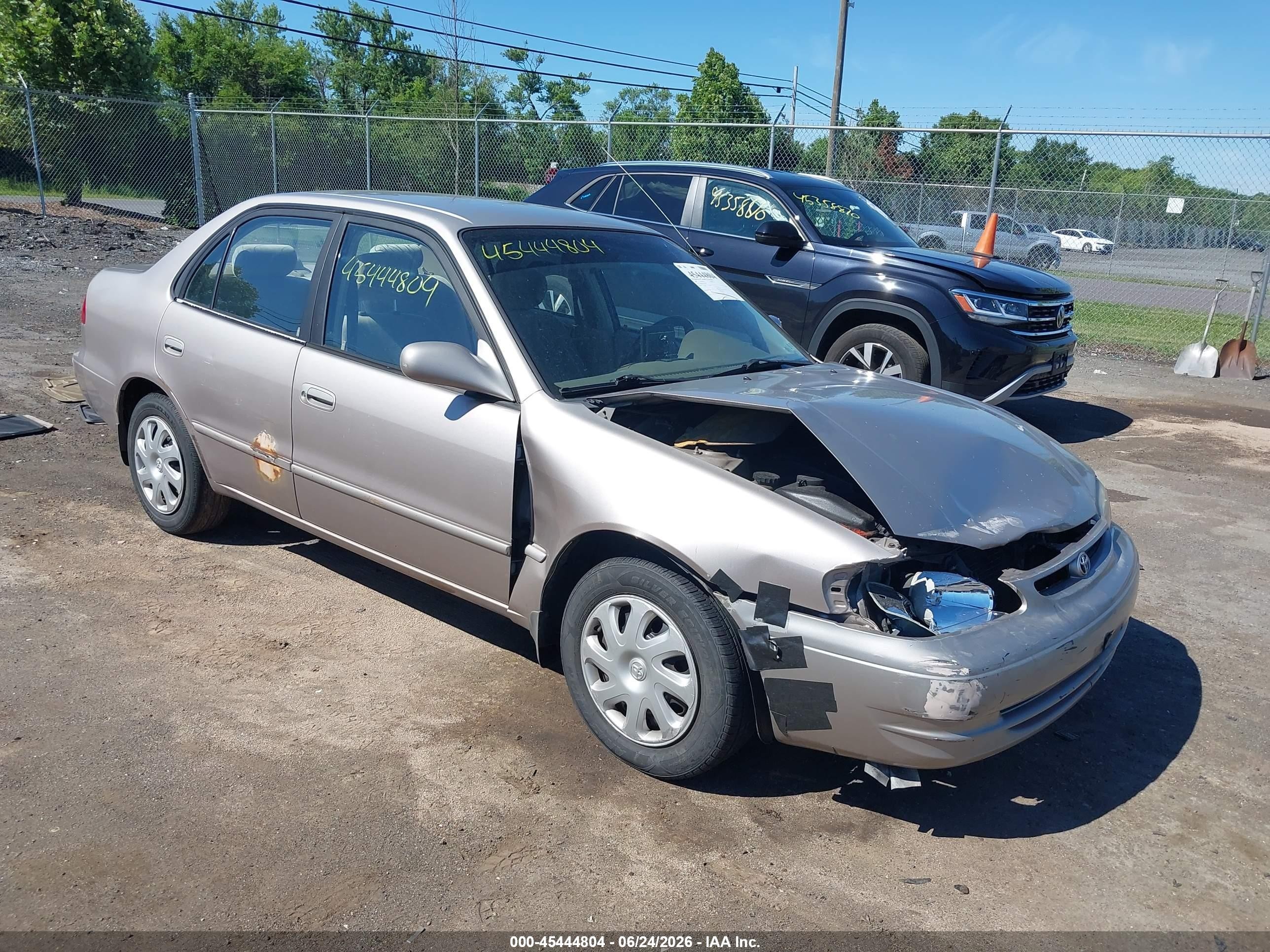 2000 Toyota Corolla Le Beige vin: 2T1BR12E9YC267927