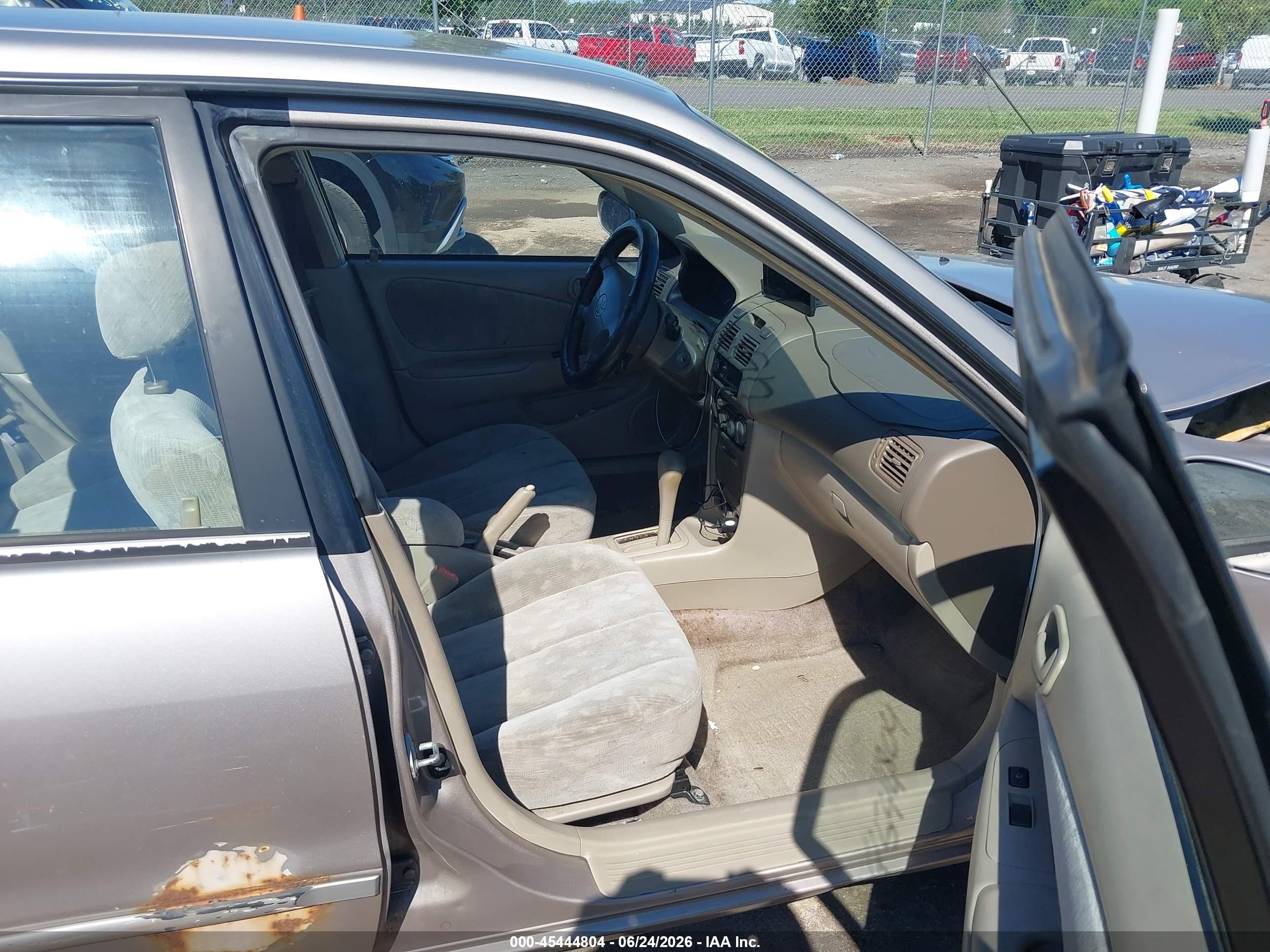 2000 Toyota Corolla Le Beige vin: 2T1BR12E9YC267927