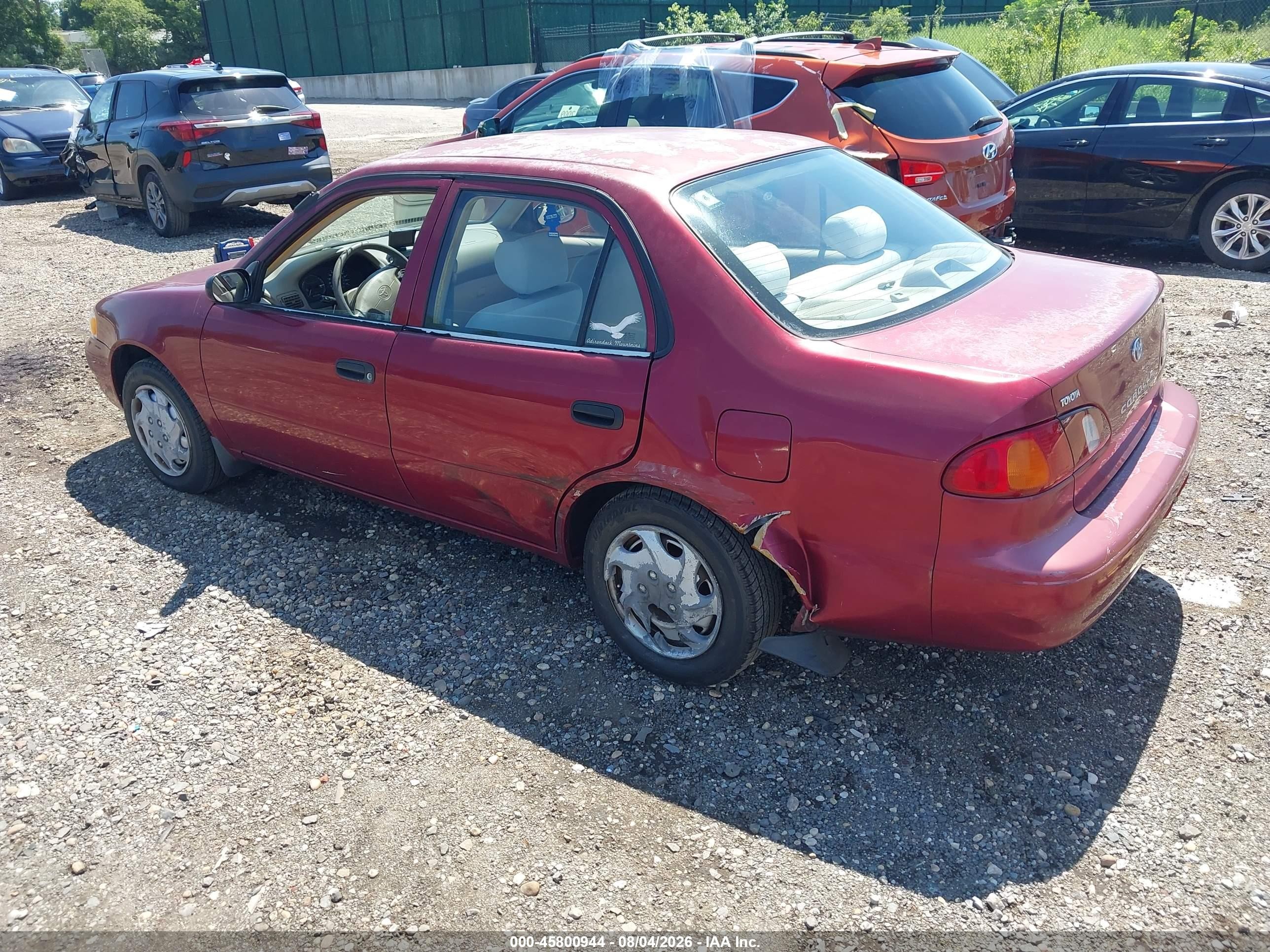 2000 Toyota Corolla Ve Maroon vin: 2T1BR12E9YC272674