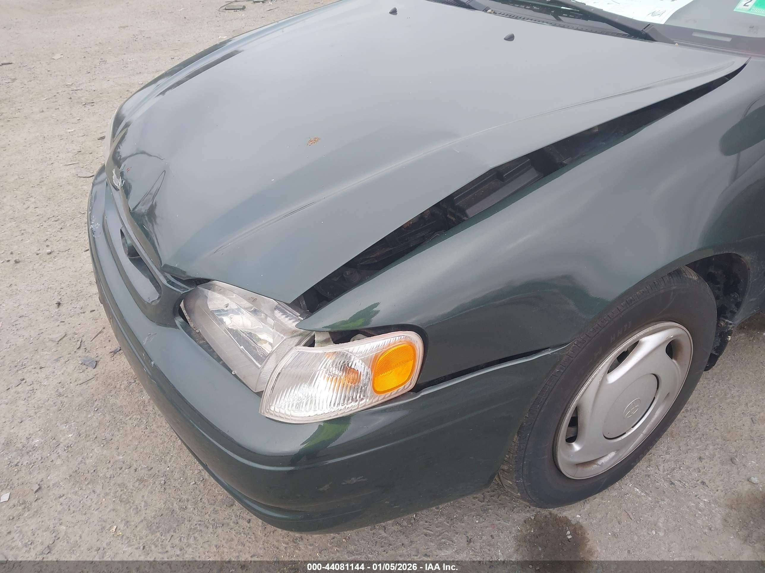 2000 Toyota Corolla Ce Green vin: 2T1BR12E9YC340343