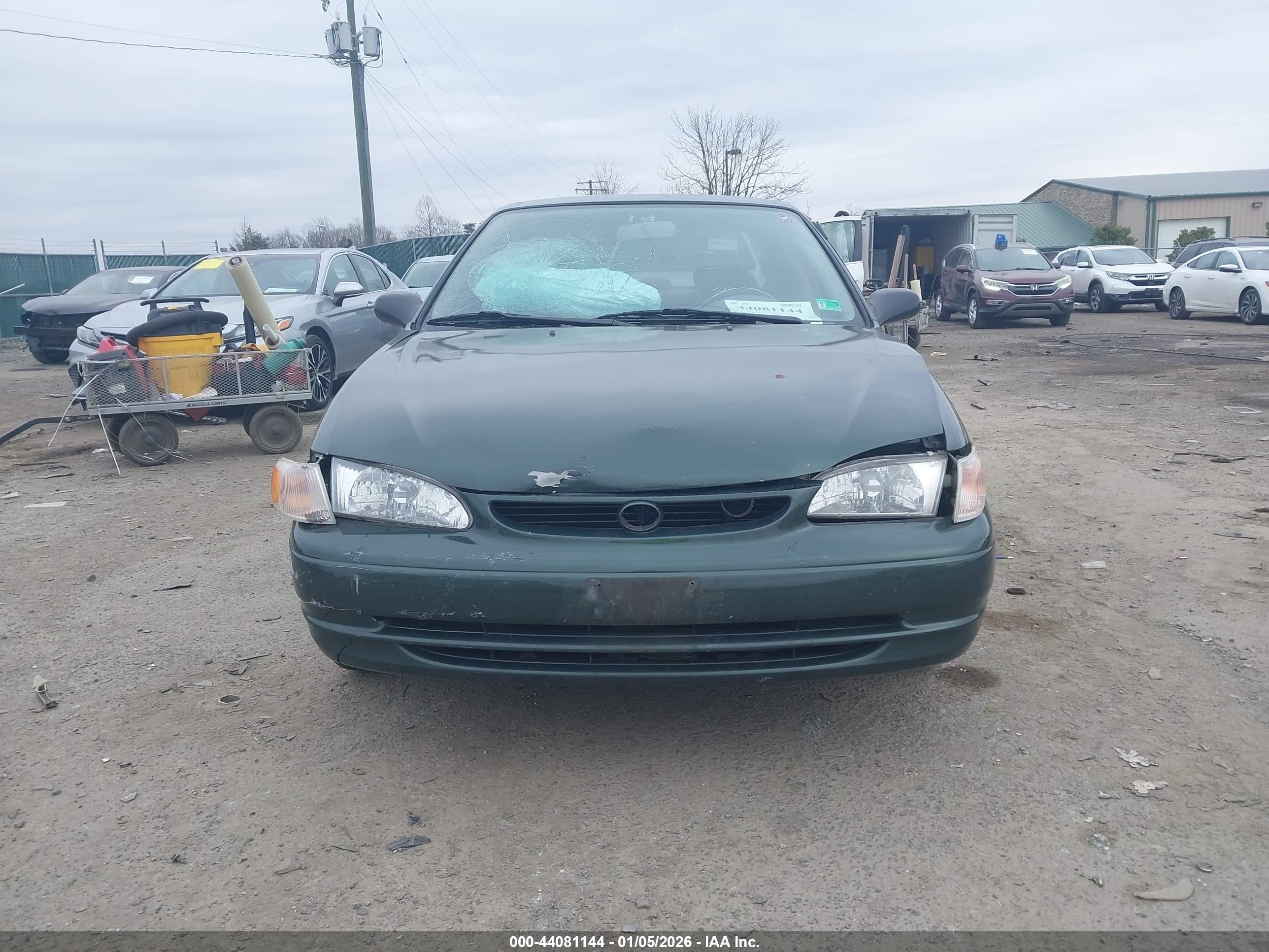 2000 Toyota Corolla Ce Green vin: 2T1BR12E9YC340343