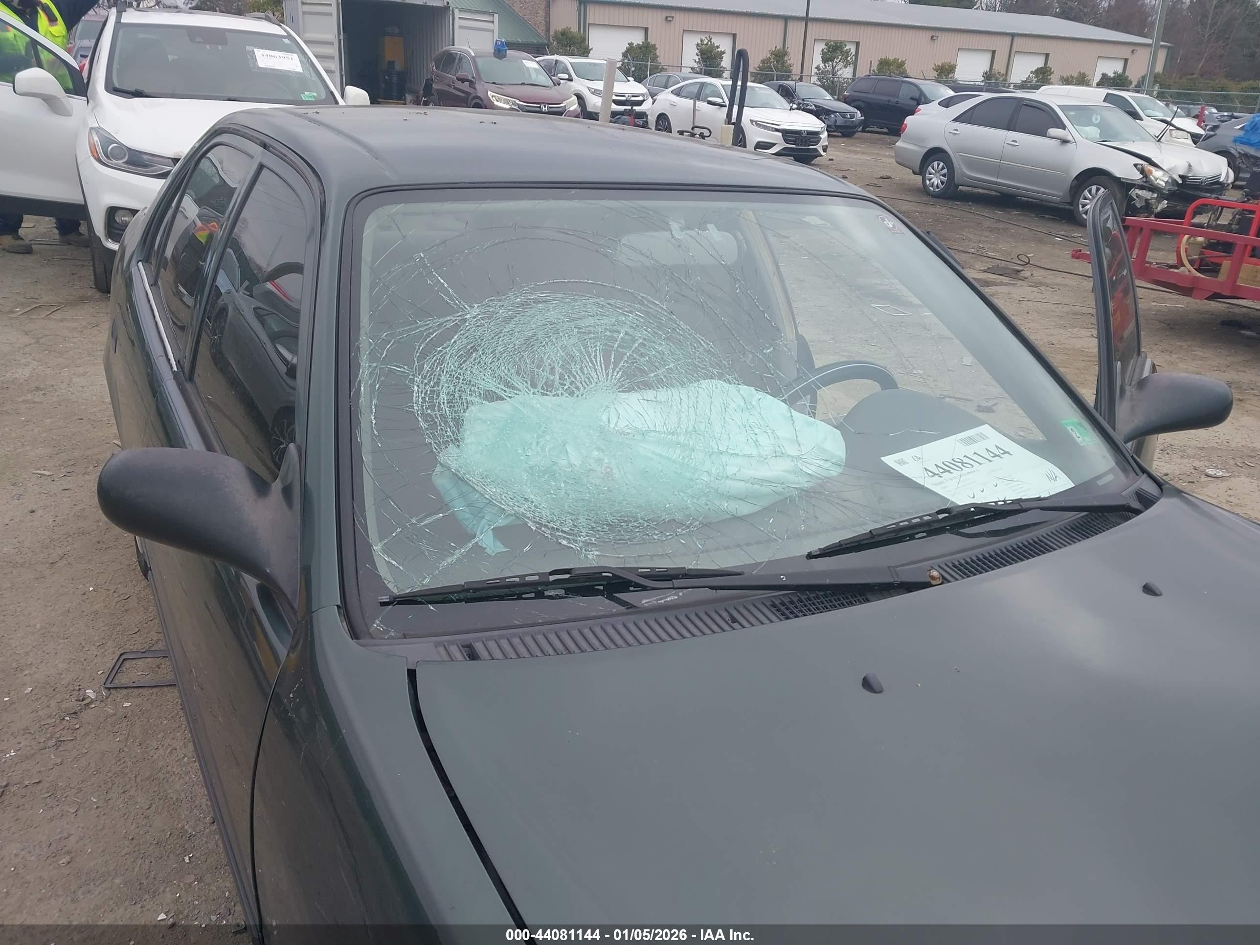 2000 Toyota Corolla Ce Green vin: 2T1BR12E9YC340343