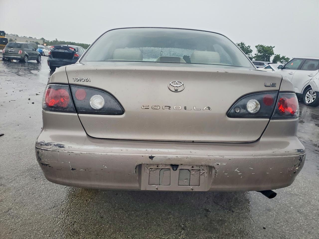 2001 Toyota Corolla Le Желто-коричневый vin: 2T1BR12EX1C411443