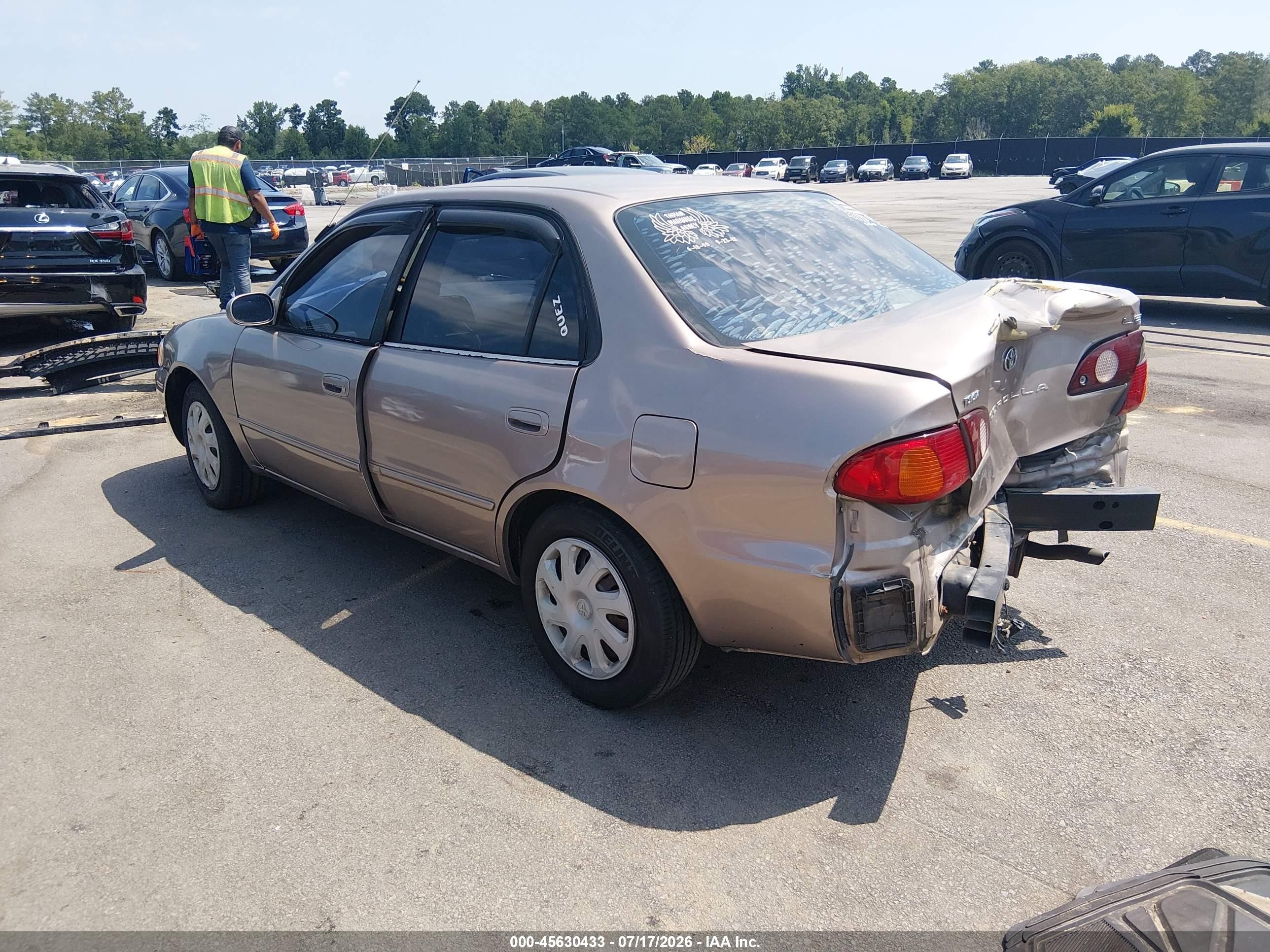 2002 Toyota Corolla Le Beige vin: 2T1BR12EX2C574305