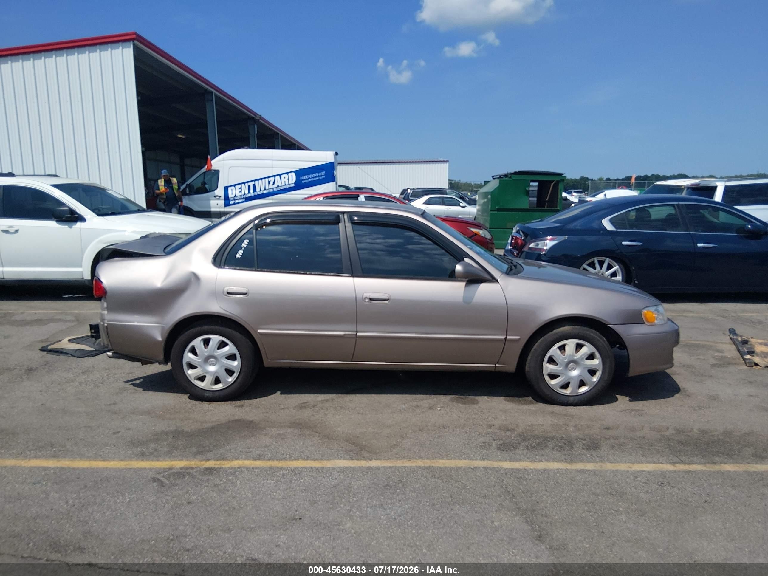2002 Toyota Corolla Le Beige vin: 2T1BR12EX2C574305
