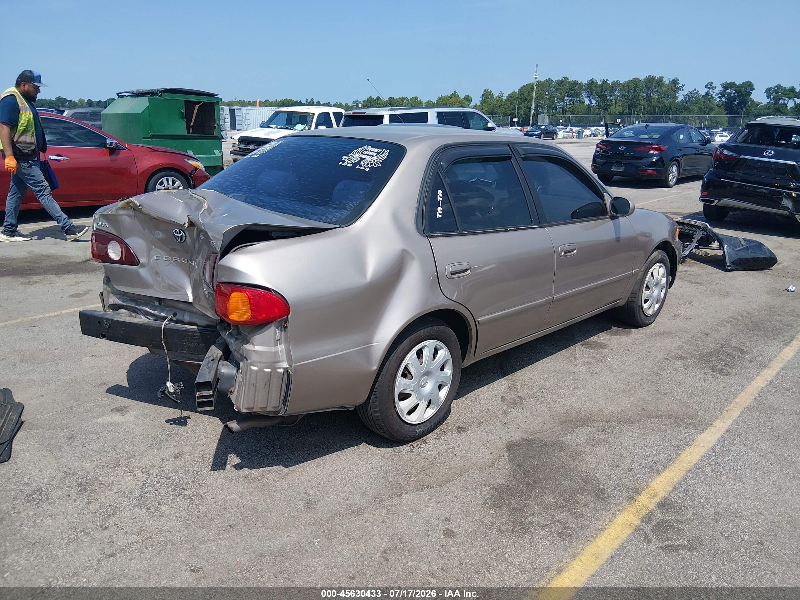 2002 Toyota Corolla Le Beige vin: 2T1BR12EX2C574305