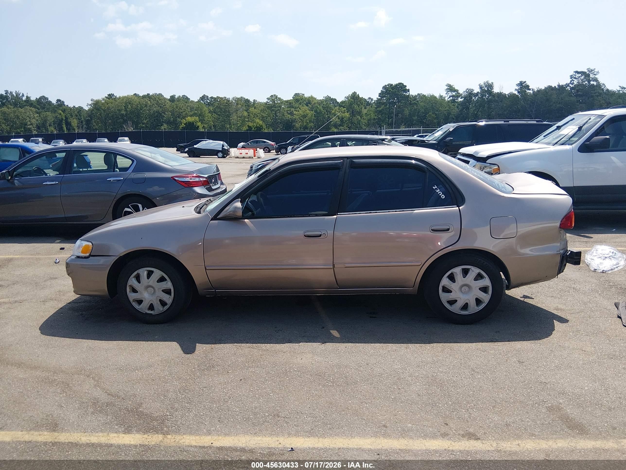 2002 Toyota Corolla Le Beige vin: 2T1BR12EX2C574305