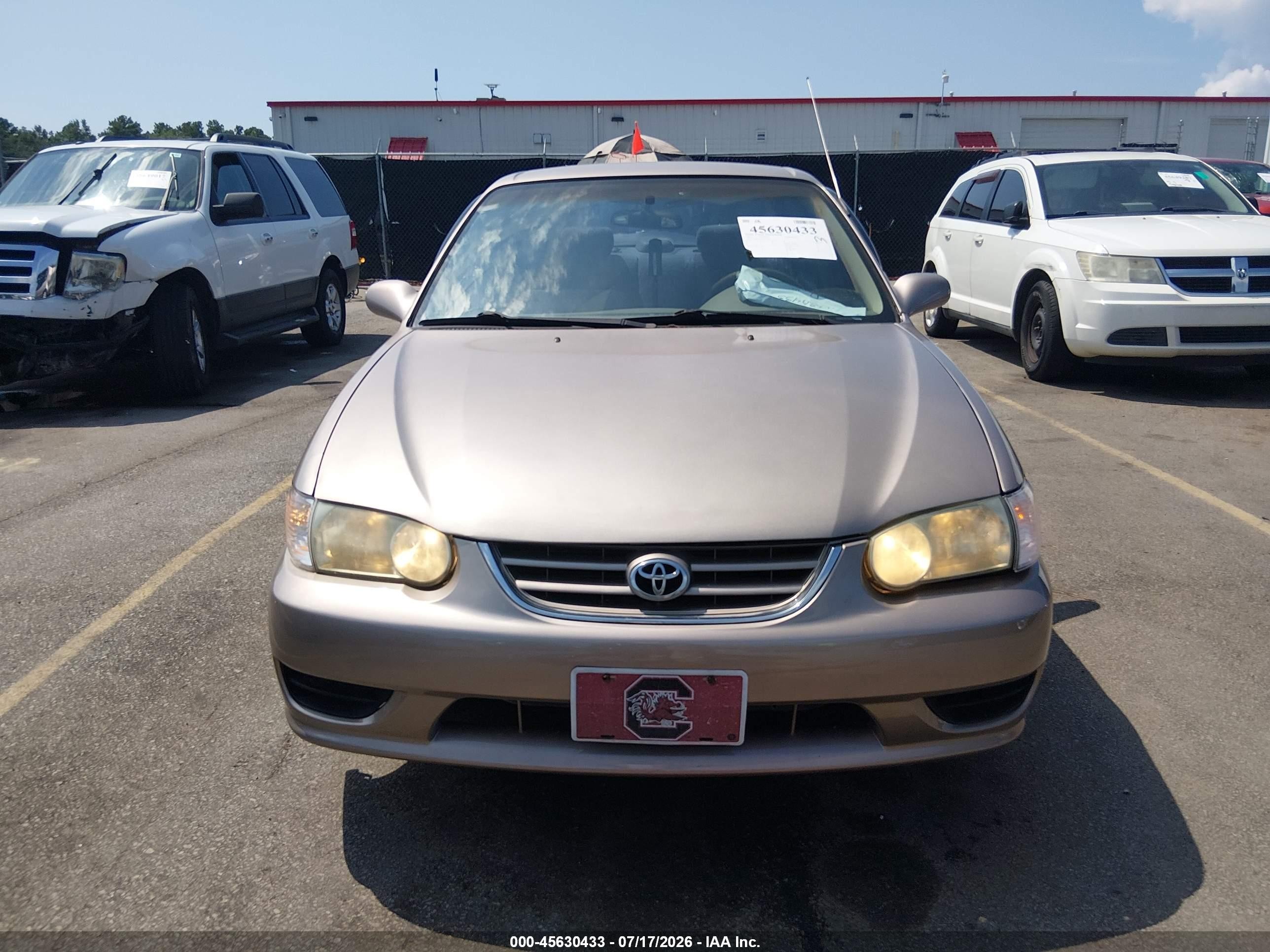 2002 Toyota Corolla Le Beige vin: 2T1BR12EX2C574305