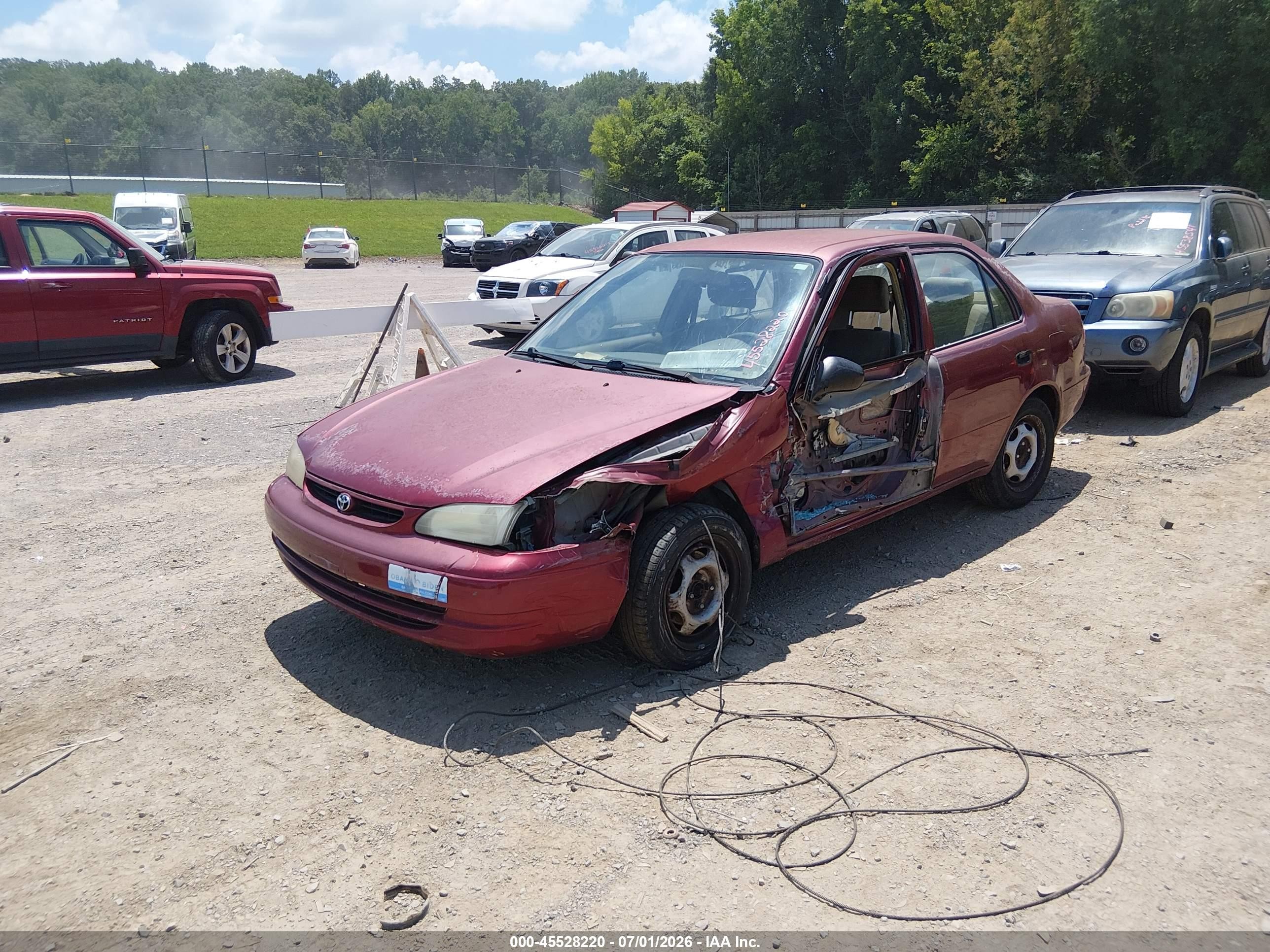 1999 Toyota Corolla Ve Maroon vin: 2T1BR12EXXC129246