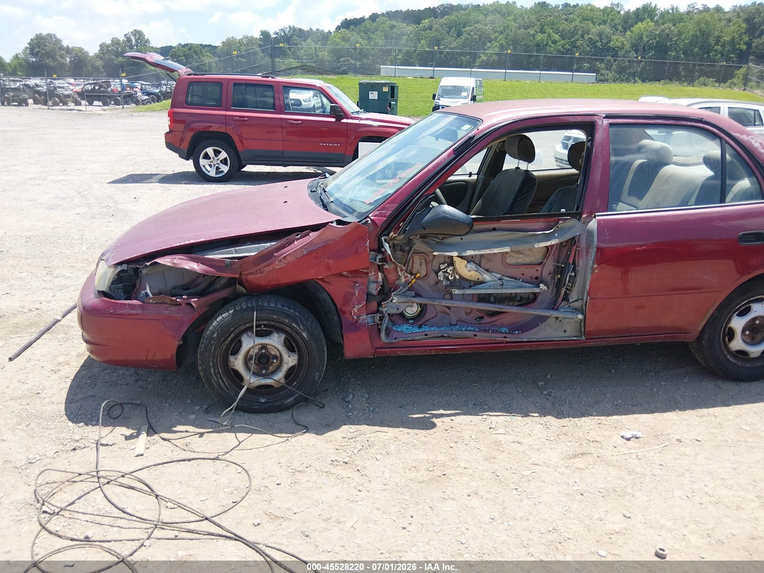 1999 Toyota Corolla Ve Maroon vin: 2T1BR12EXXC129246