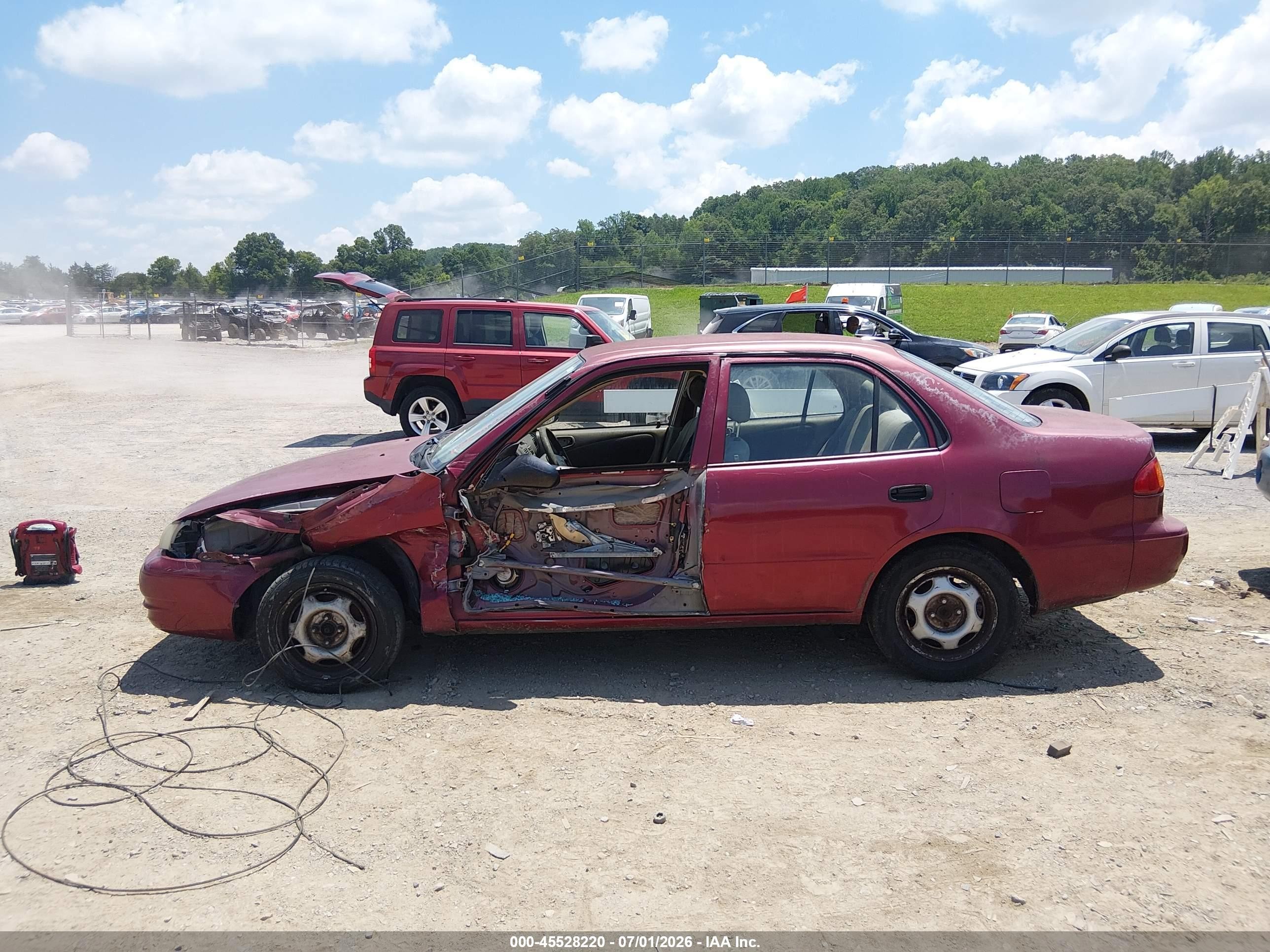 1999 Toyota Corolla Ve Maroon vin: 2T1BR12EXXC129246