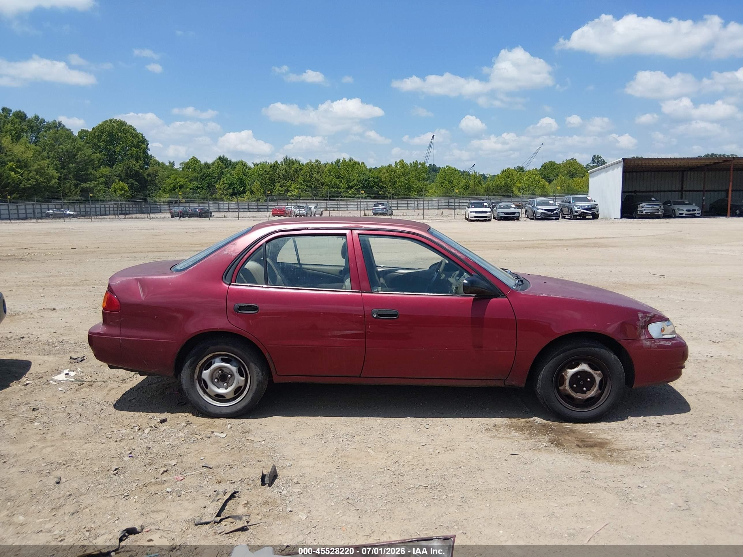 1999 Toyota Corolla Ve Maroon vin: 2T1BR12EXXC129246