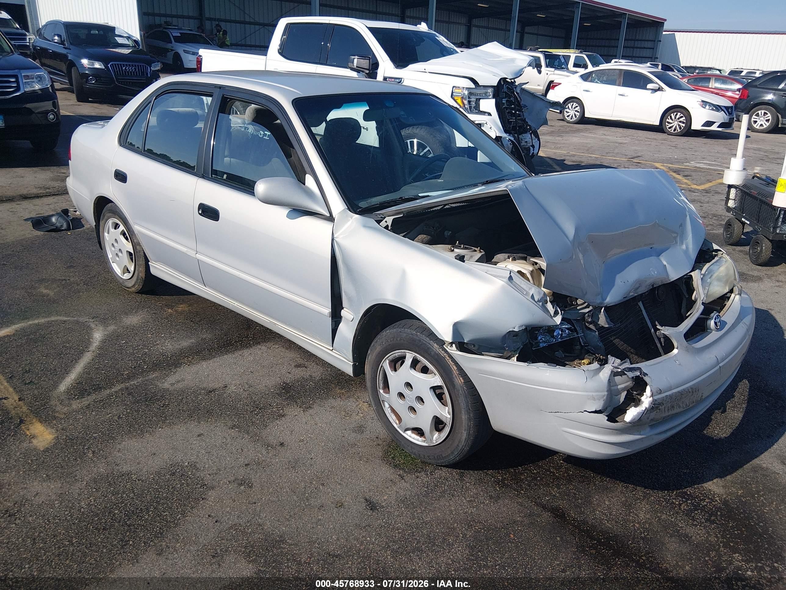 1999 Toyota Corolla Le Gray vin: 2T1BR12EXXC188474