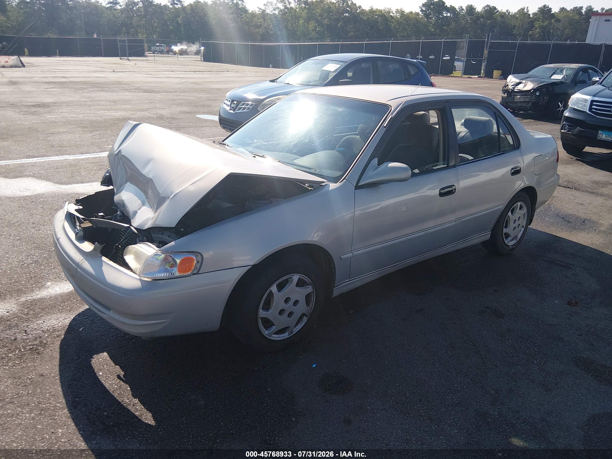 1999 Toyota Corolla Le Gray vin: 2T1BR12EXXC188474