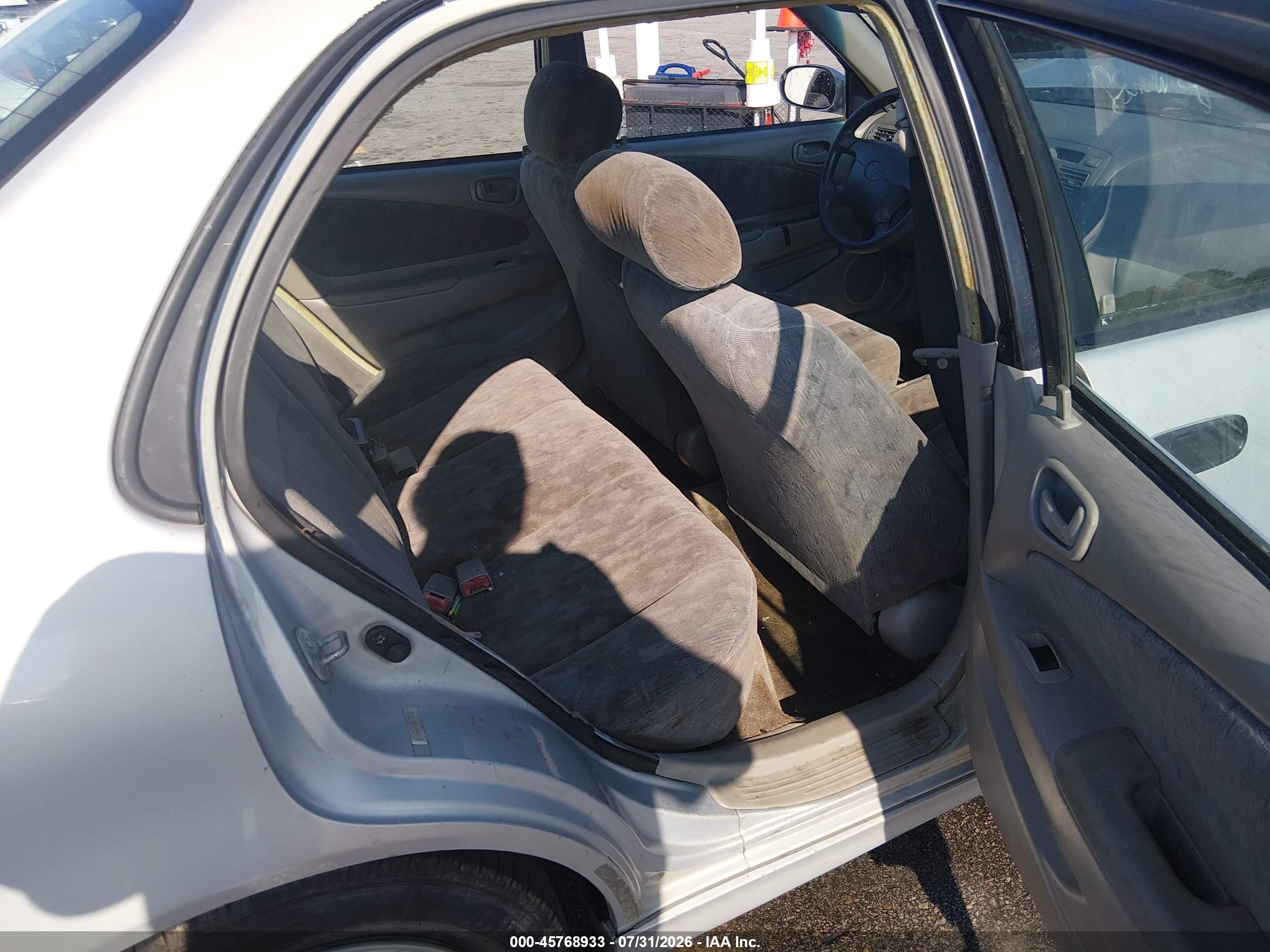 1999 Toyota Corolla Le Gray vin: 2T1BR12EXXC188474