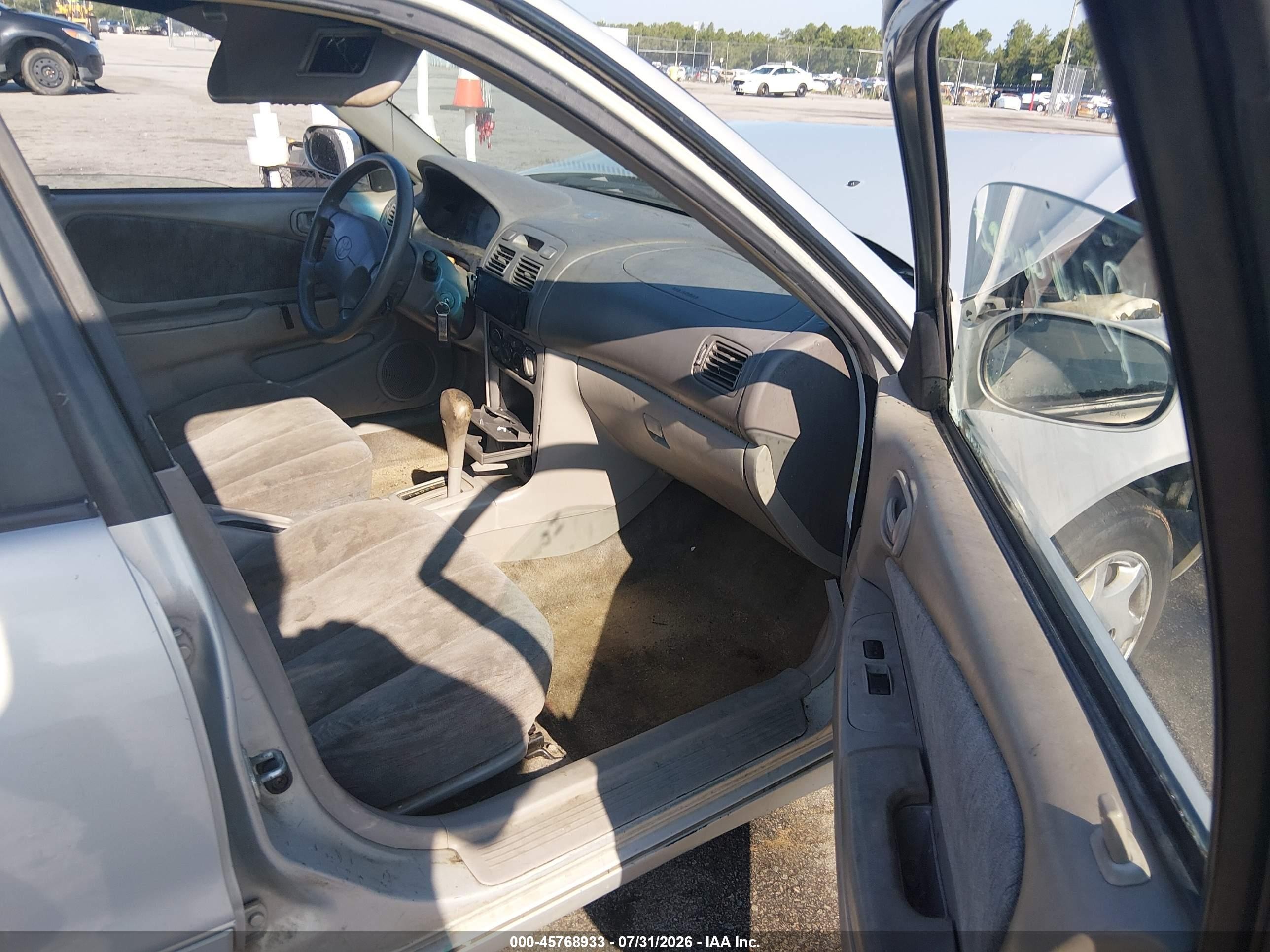 1999 Toyota Corolla Le Gray vin: 2T1BR12EXXC188474