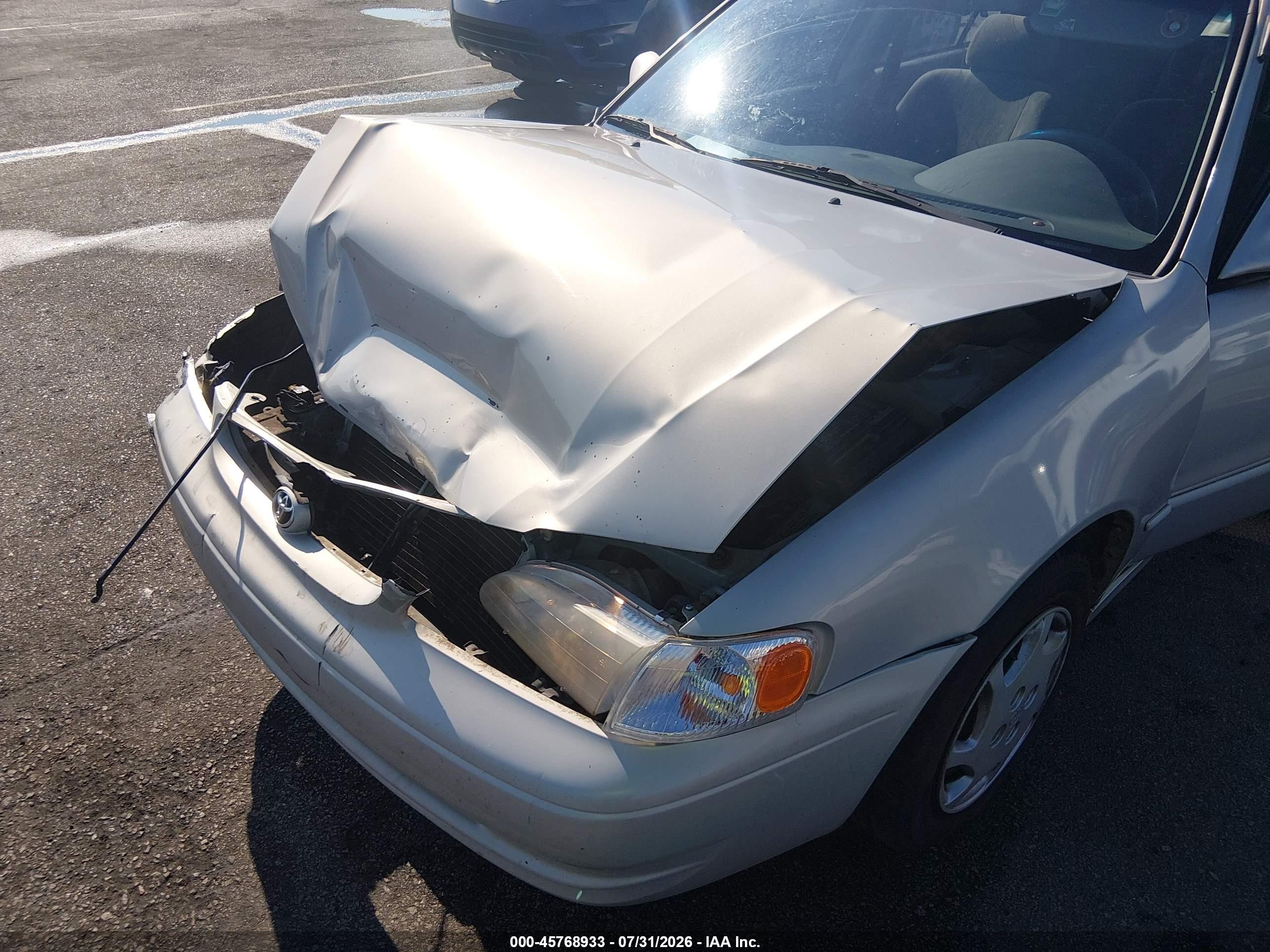 1999 Toyota Corolla Le Gray vin: 2T1BR12EXXC188474