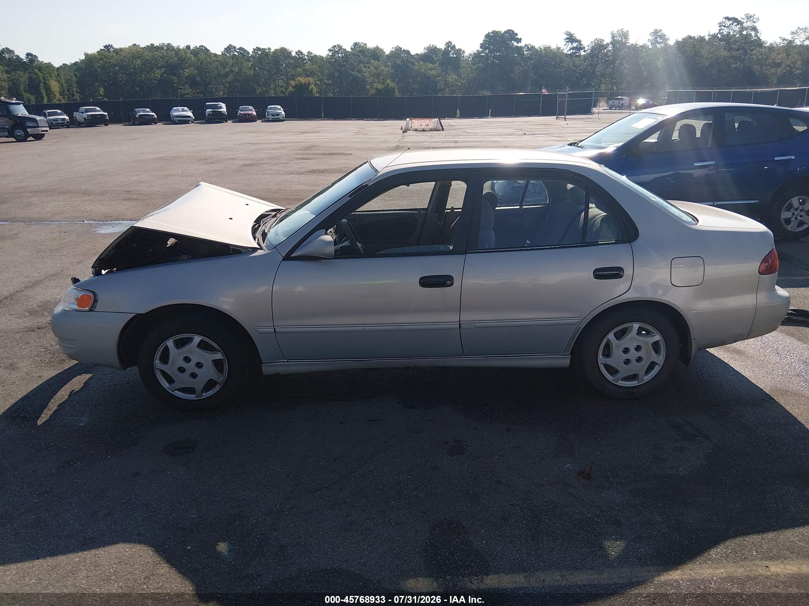 1999 Toyota Corolla Le Gray vin: 2T1BR12EXXC188474