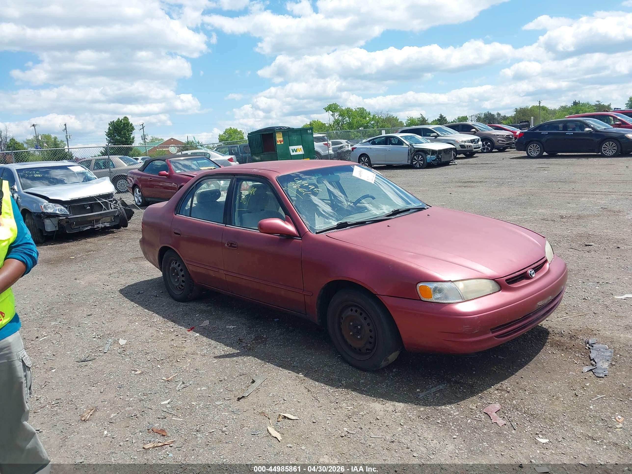 1999 Toyota Corolla Le Red vin: 2T1BR12EXXC209663