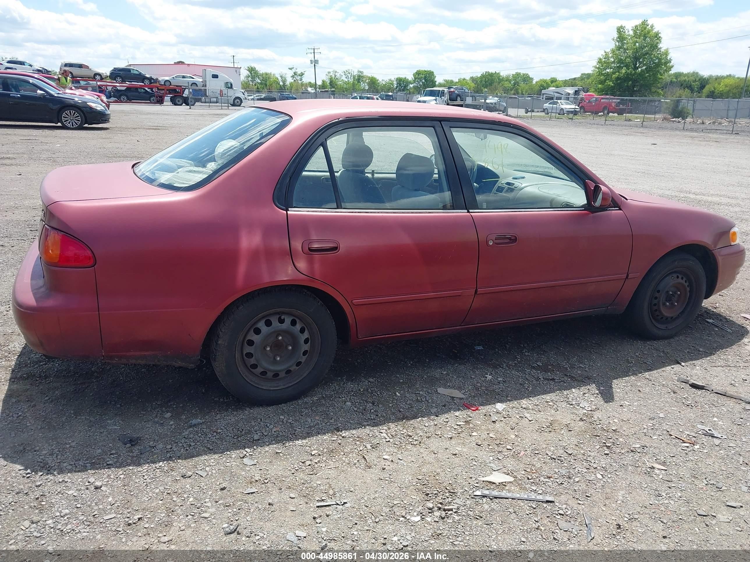 1999 Toyota Corolla Le Red vin: 2T1BR12EXXC209663