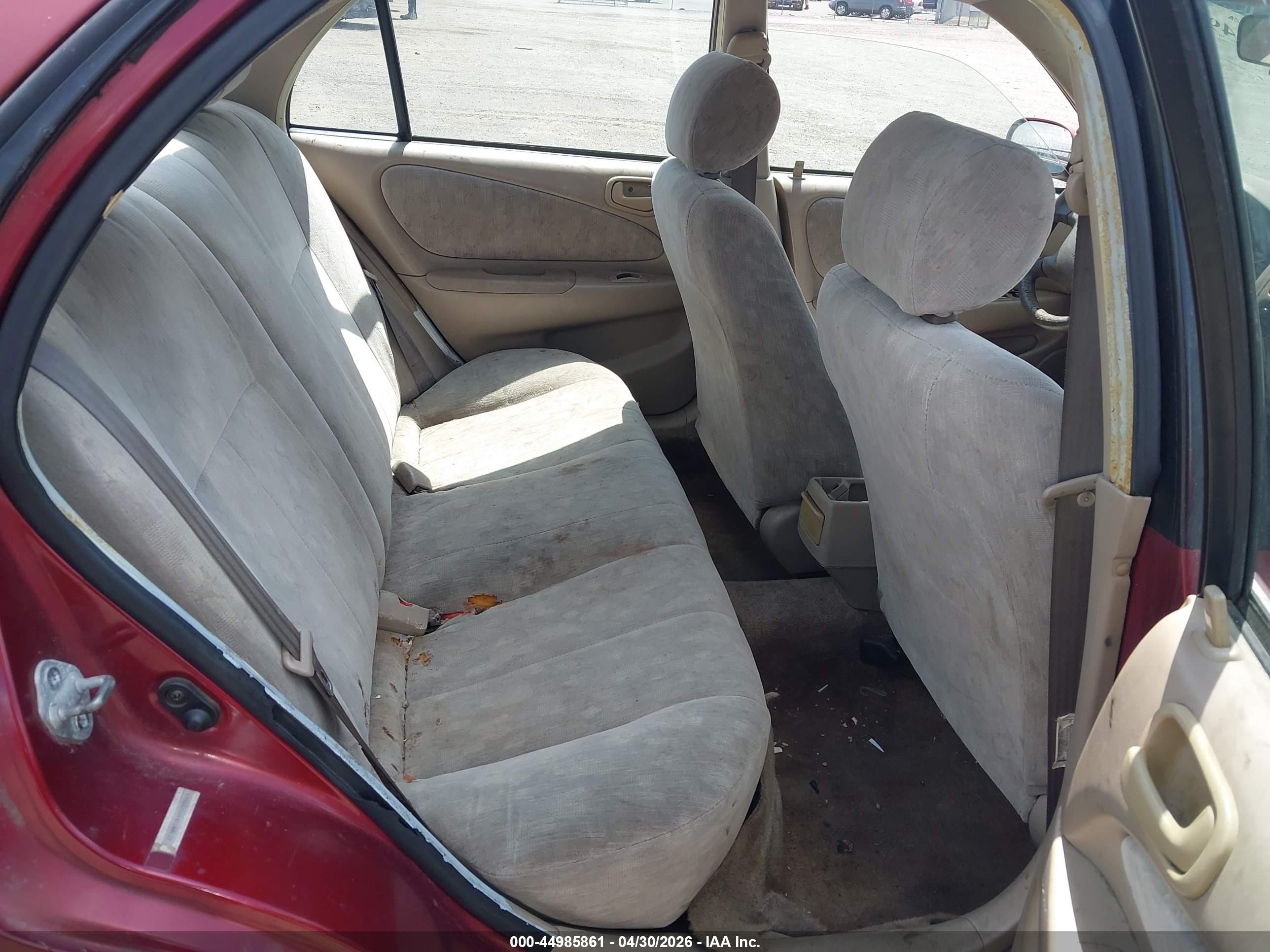 1999 Toyota Corolla Le Red vin: 2T1BR12EXXC209663