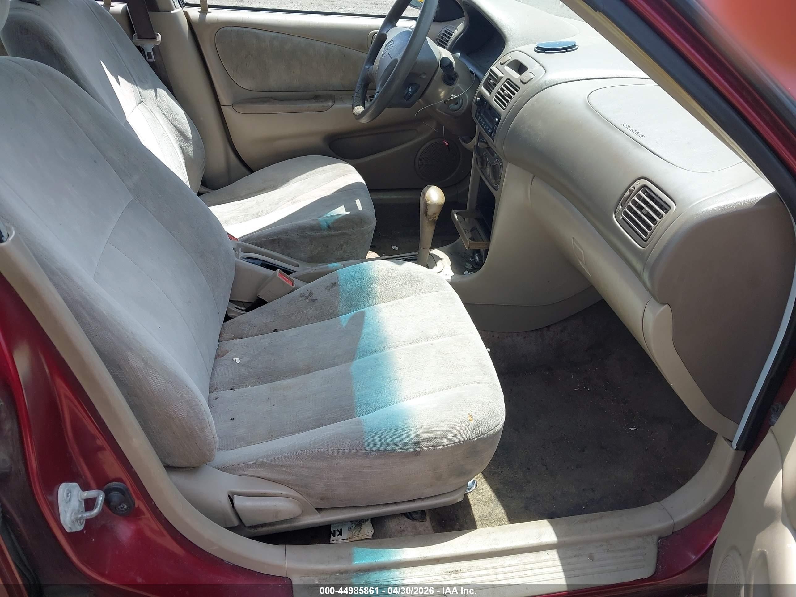 1999 Toyota Corolla Le Red vin: 2T1BR12EXXC209663